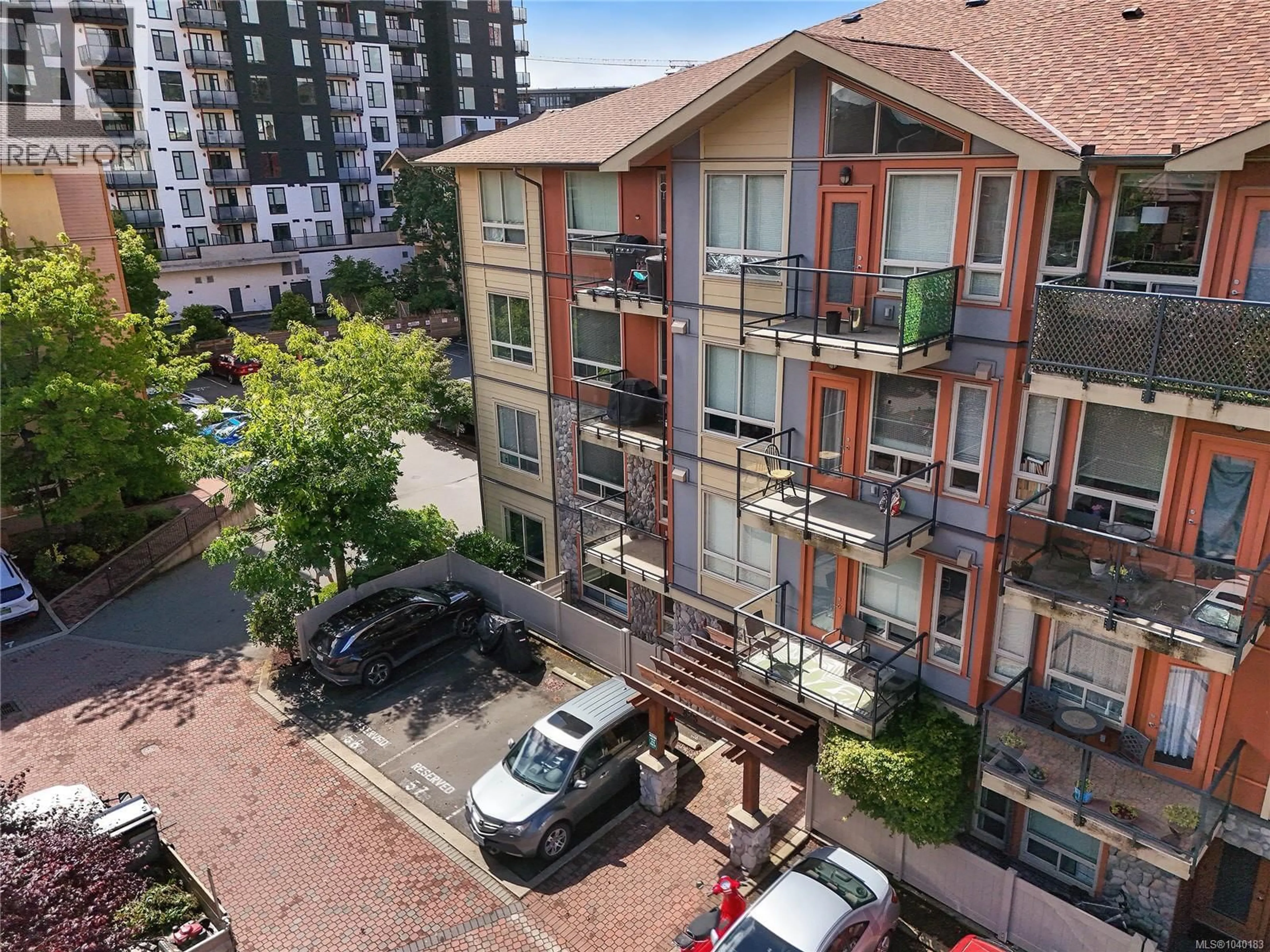 A pic from outside/outdoor area/front of a property/back of a property/a pic from drone, city buildings view from balcony for 102 - 825 GOLDSTREAM AVENUE, Langford British Columbia V9B2X8