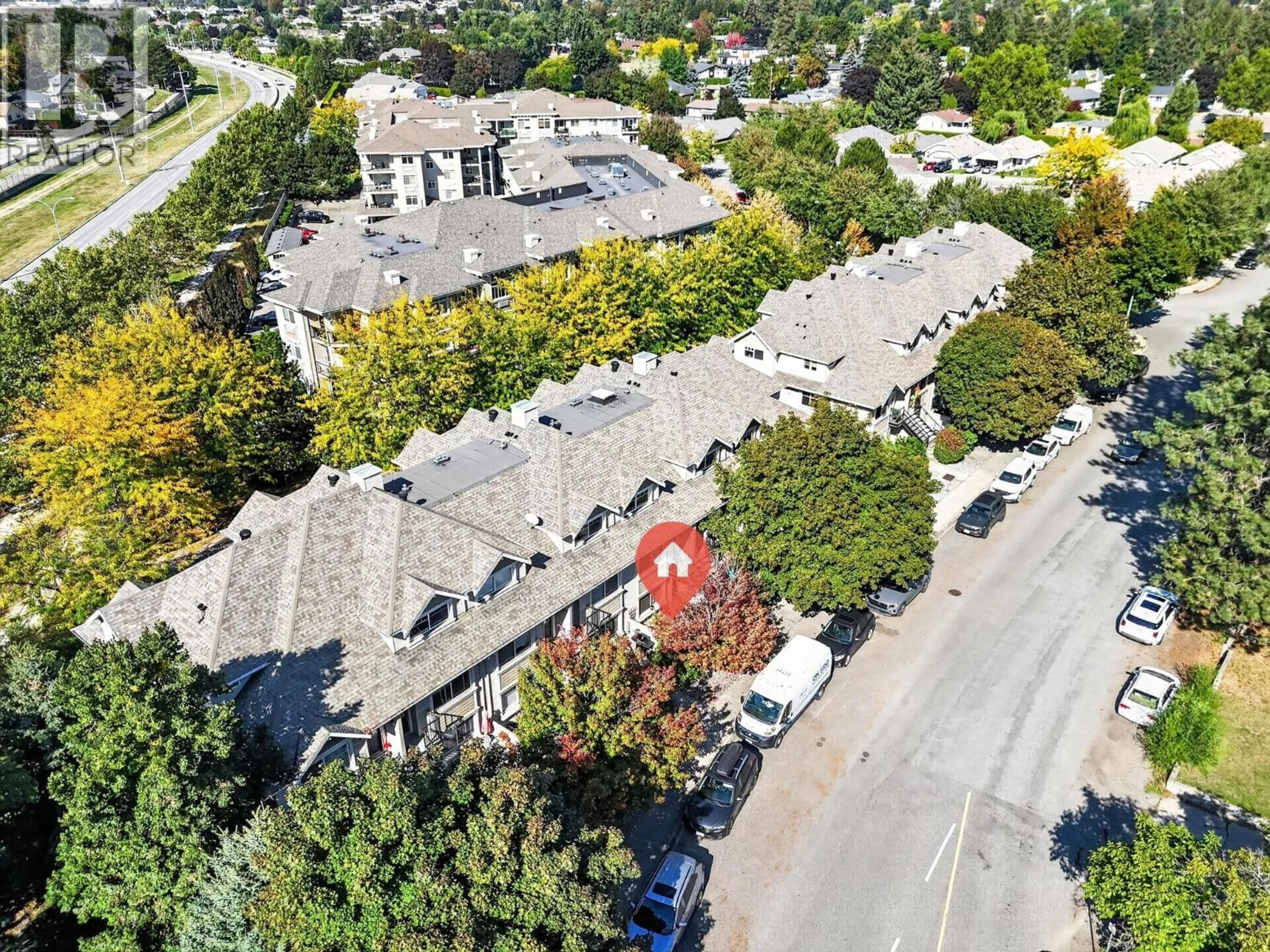 A pic from outside/outdoor area/front of a property/back of a property/a pic from drone, street for 113 - 1390 DILWORTH CRESCENT, Kelowna British Columbia V1Y4M5