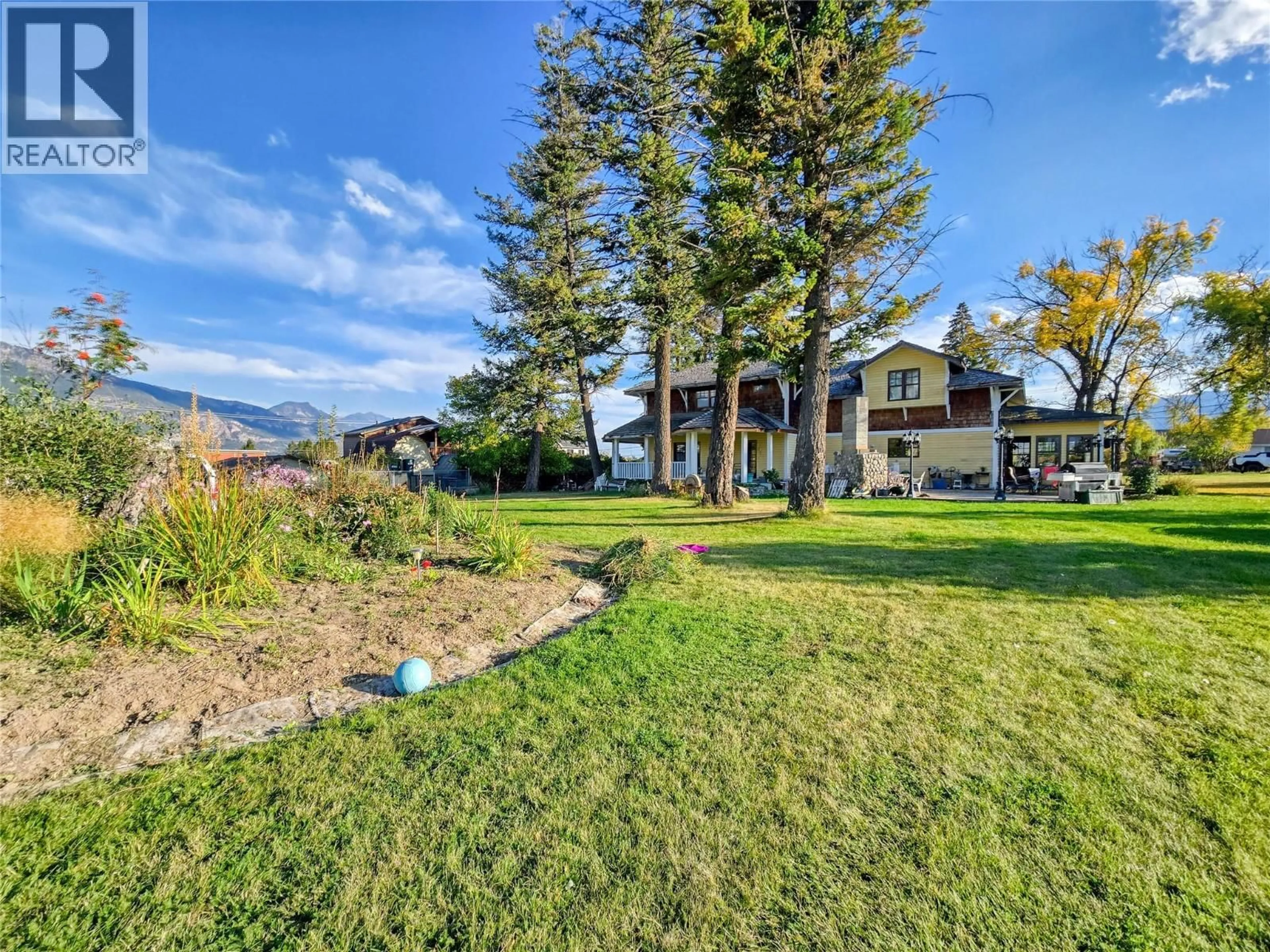A pic from outside/outdoor area/front of a property/back of a property/a pic from drone, water/lake/river/ocean view for 1018 5TH STREET, Invermere British Columbia V0A1K0