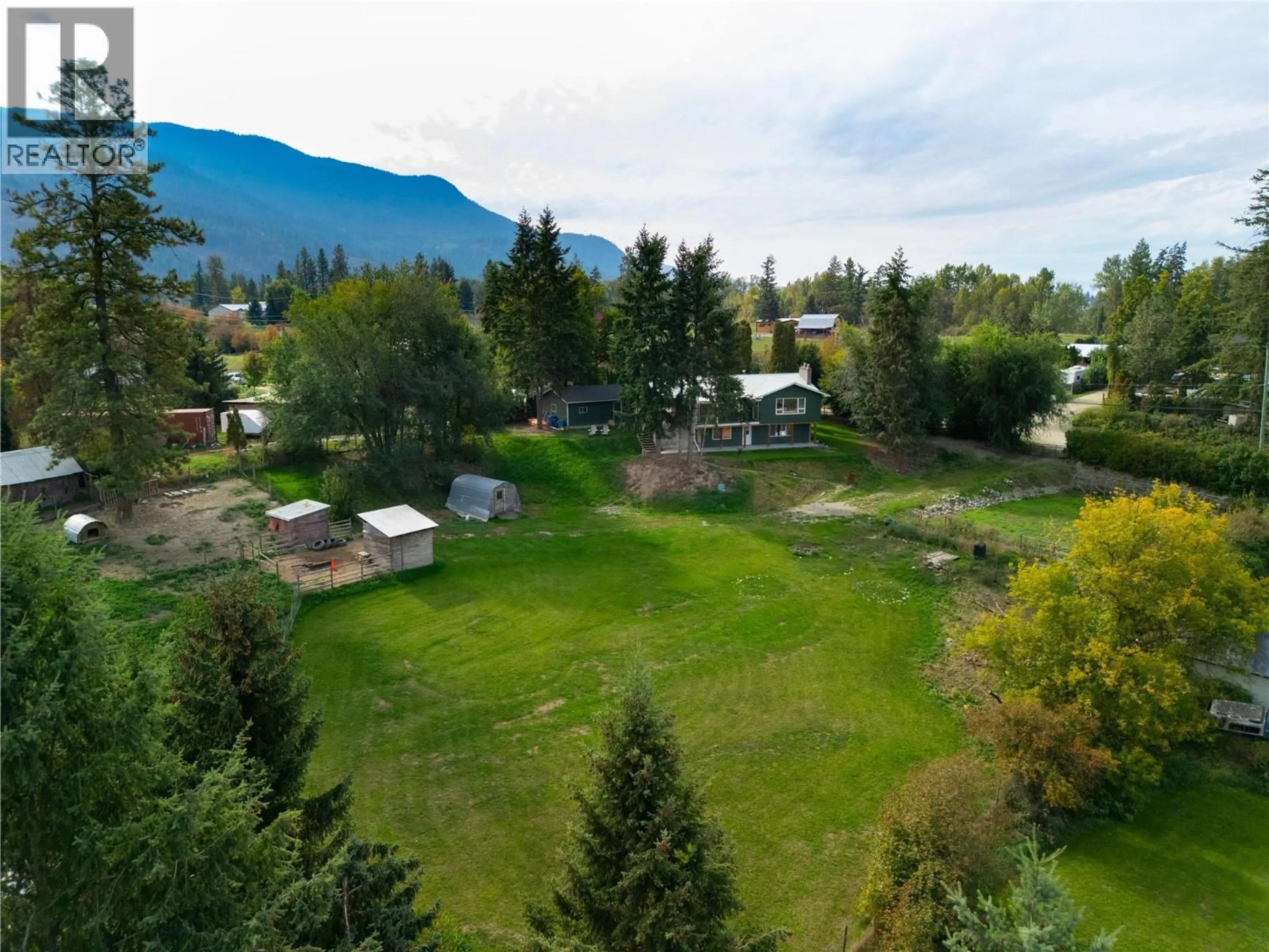 A pic from outside/outdoor area/front of a property/back of a property/a pic from drone, mountain view for 3764 CREAMERY ROAD, Armstrong British Columbia V0E1B8