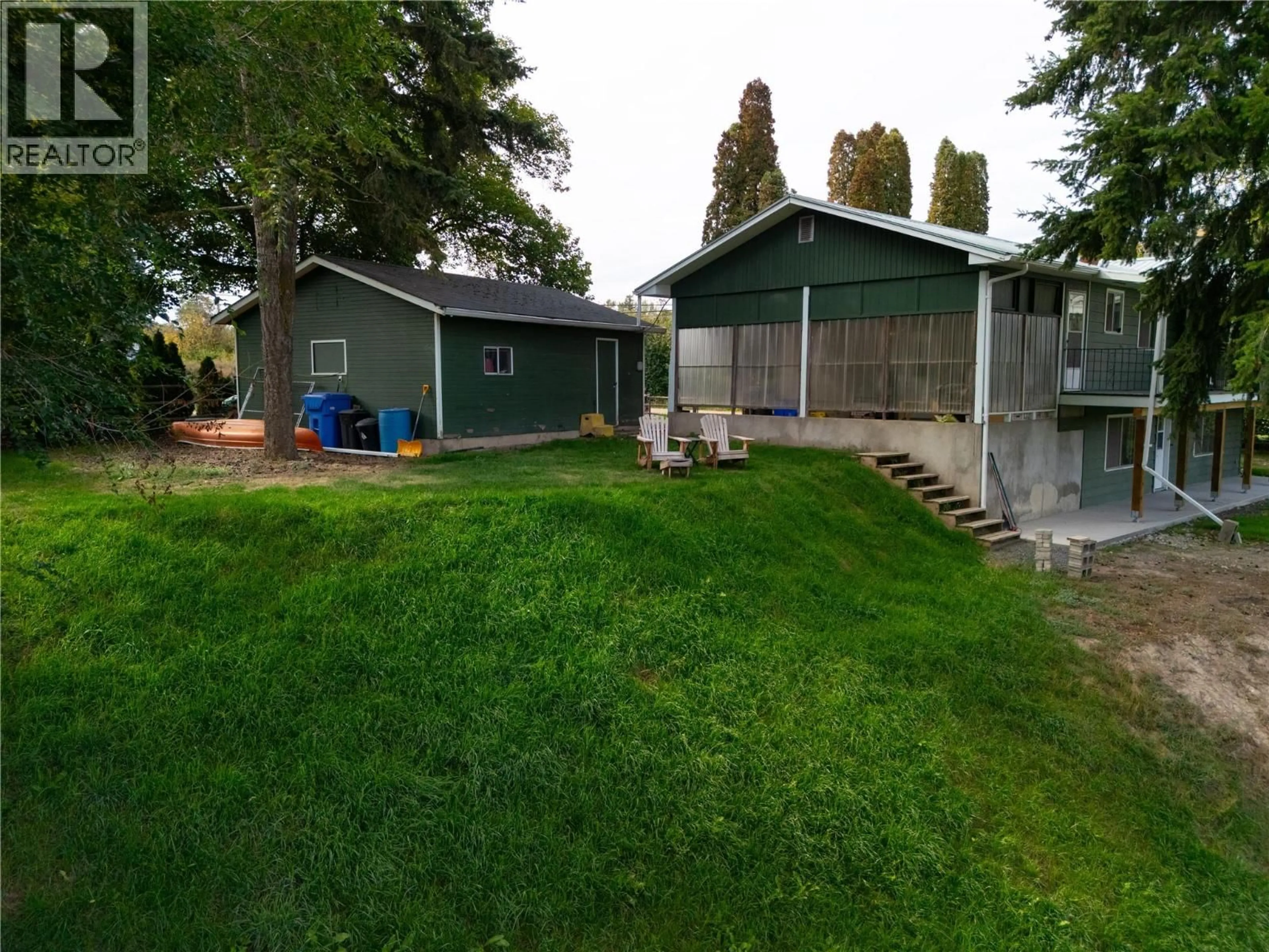 A pic from outside/outdoor area/front of a property/back of a property/a pic from drone, street for 3764 CREAMERY ROAD, Armstrong British Columbia V0E1B8