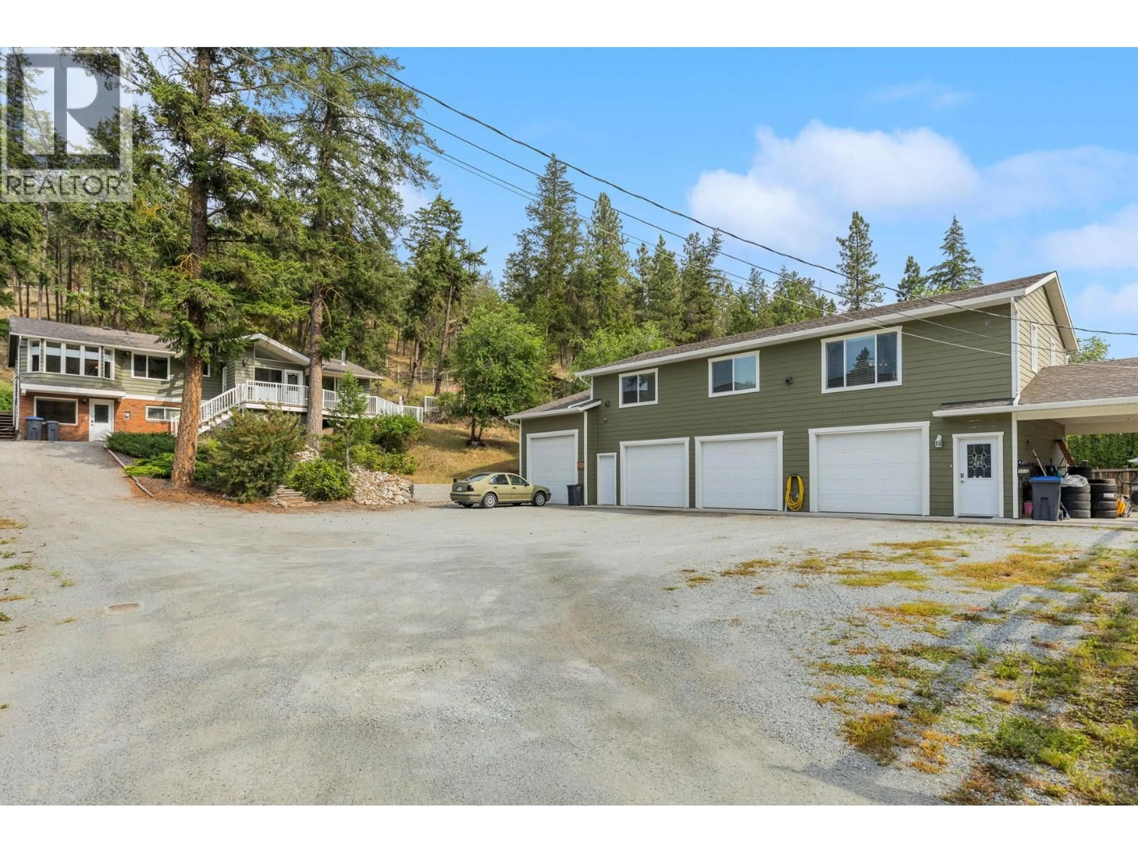 A pic from outside/outdoor area/front of a property/back of a property/a pic from drone, street for 353 CLIFTON ROAD SOUTH, Kelowna British Columbia V1V1A4