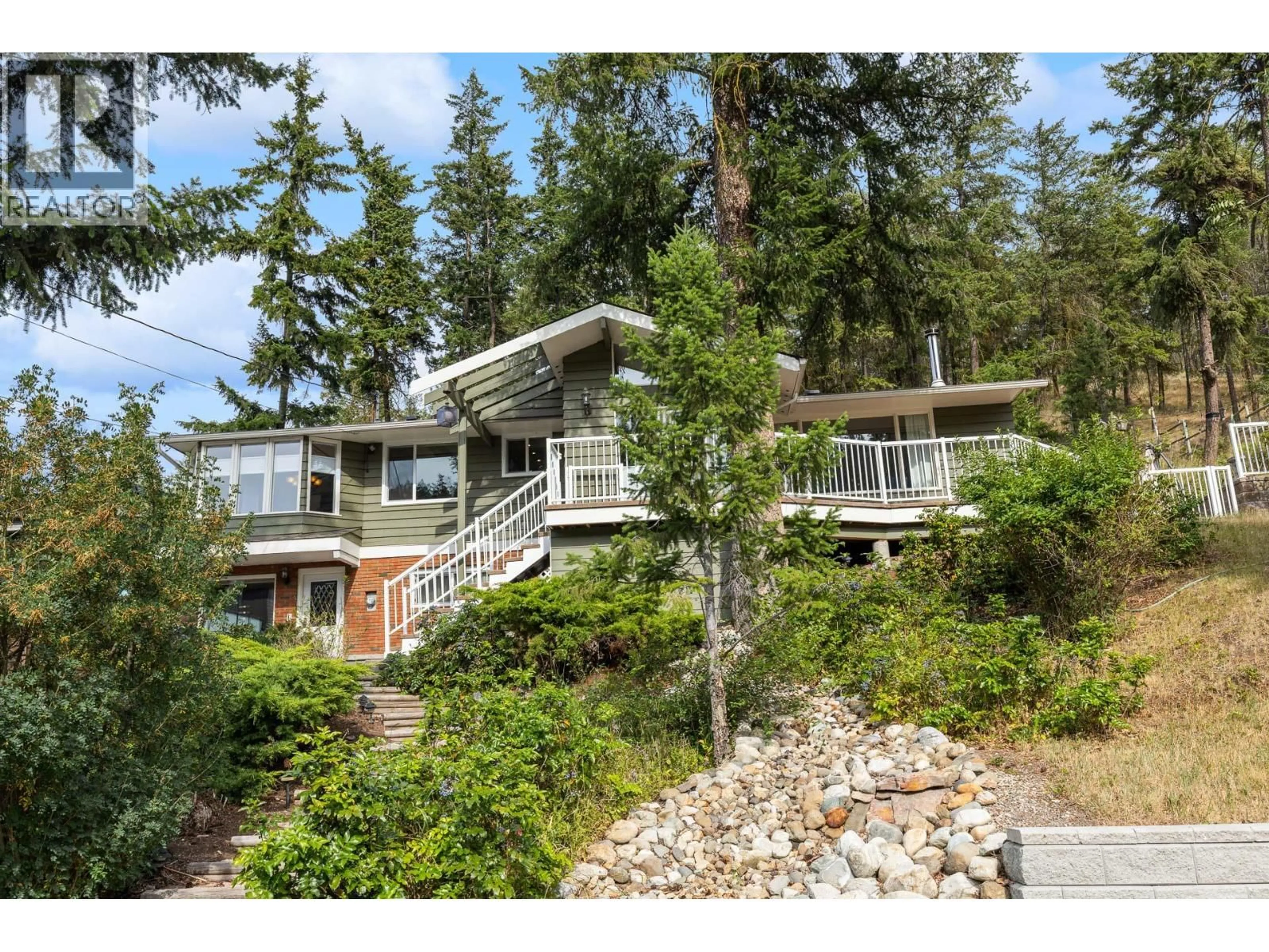 Home with vinyl exterior material, unknown for 353 CLIFTON ROAD SOUTH, Kelowna British Columbia V1V1A4