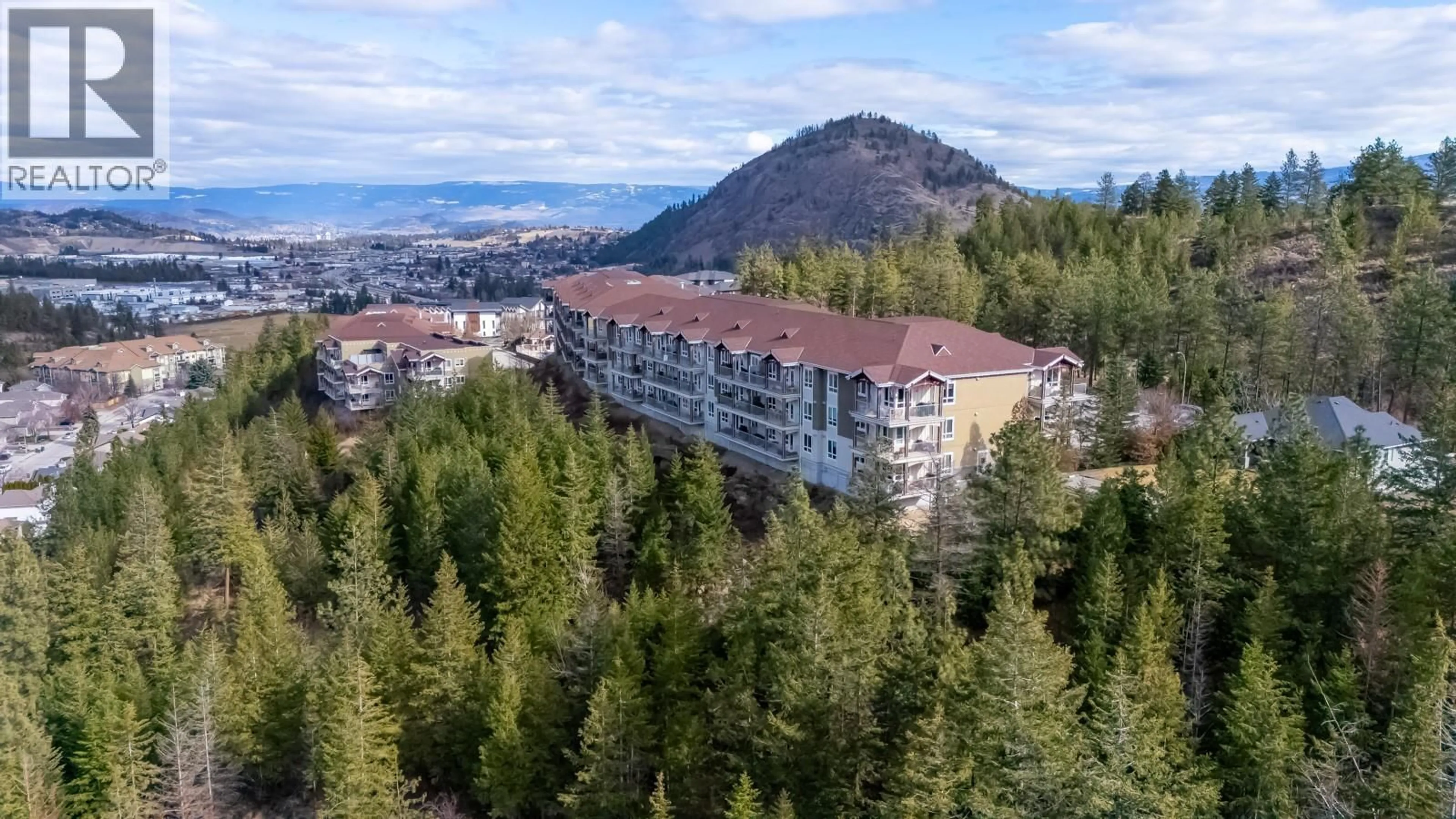 A pic from outside/outdoor area/front of a property/back of a property/a pic from drone, mountain view for 1314 - 2210 UPPER SUNDANCE DRIVE, West Kelowna British Columbia V4T3E9