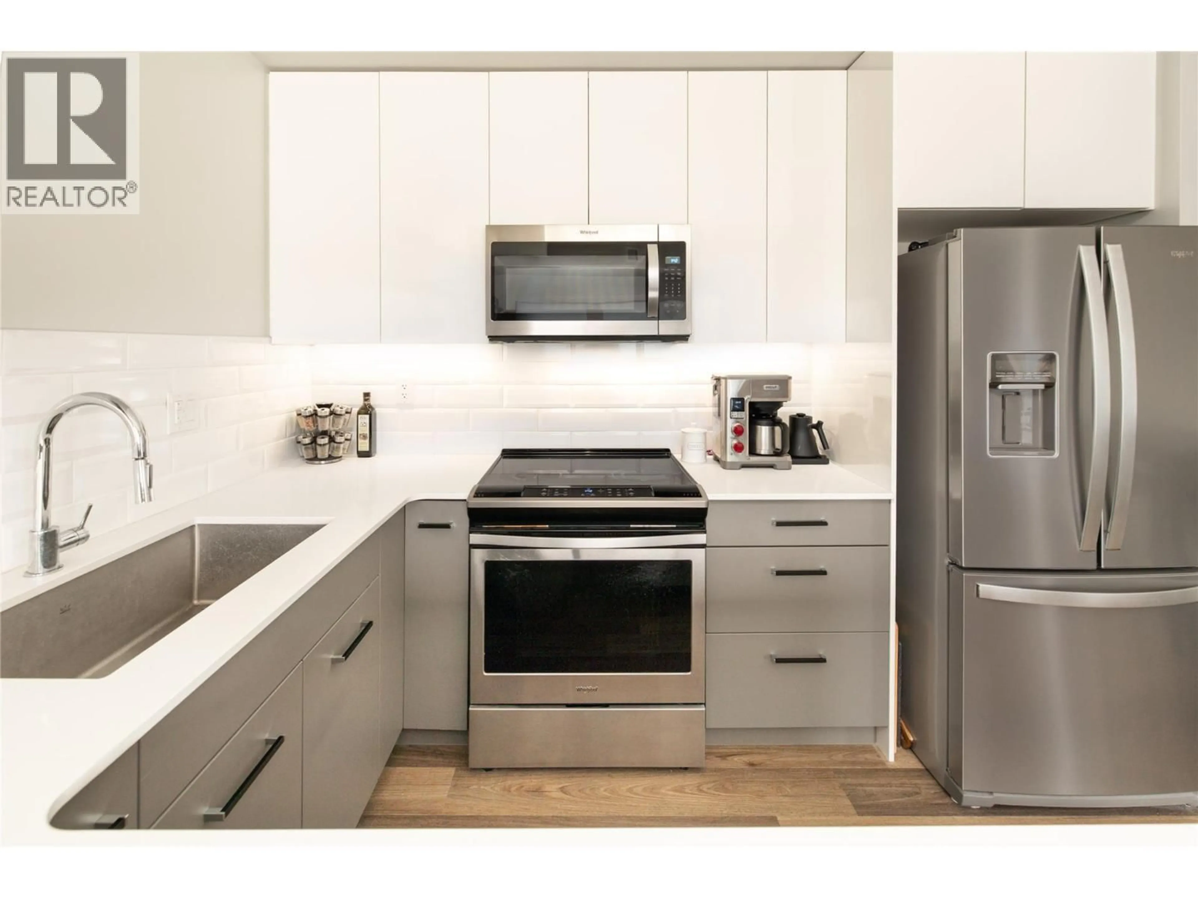 Contemporary kitchen, ceramic/tile floor for 402 - 722 VALLEY ROAD, Kelowna British Columbia V1V0E2