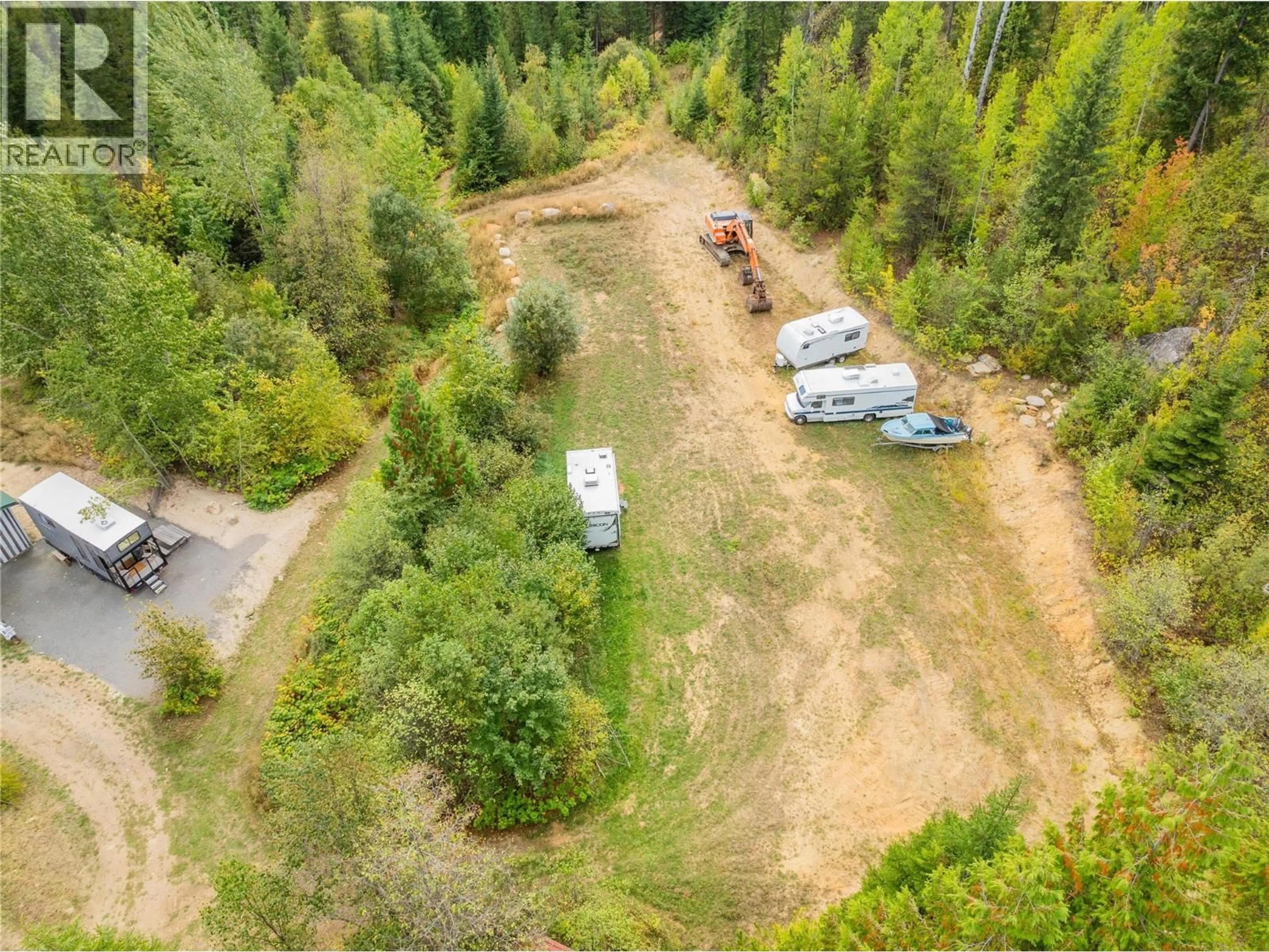 A pic from outside/outdoor area/front of a property/back of a property/a pic from drone, forest/trees view for 2396 NAULT ROAD, Pass Creek British Columbia V1N4T5