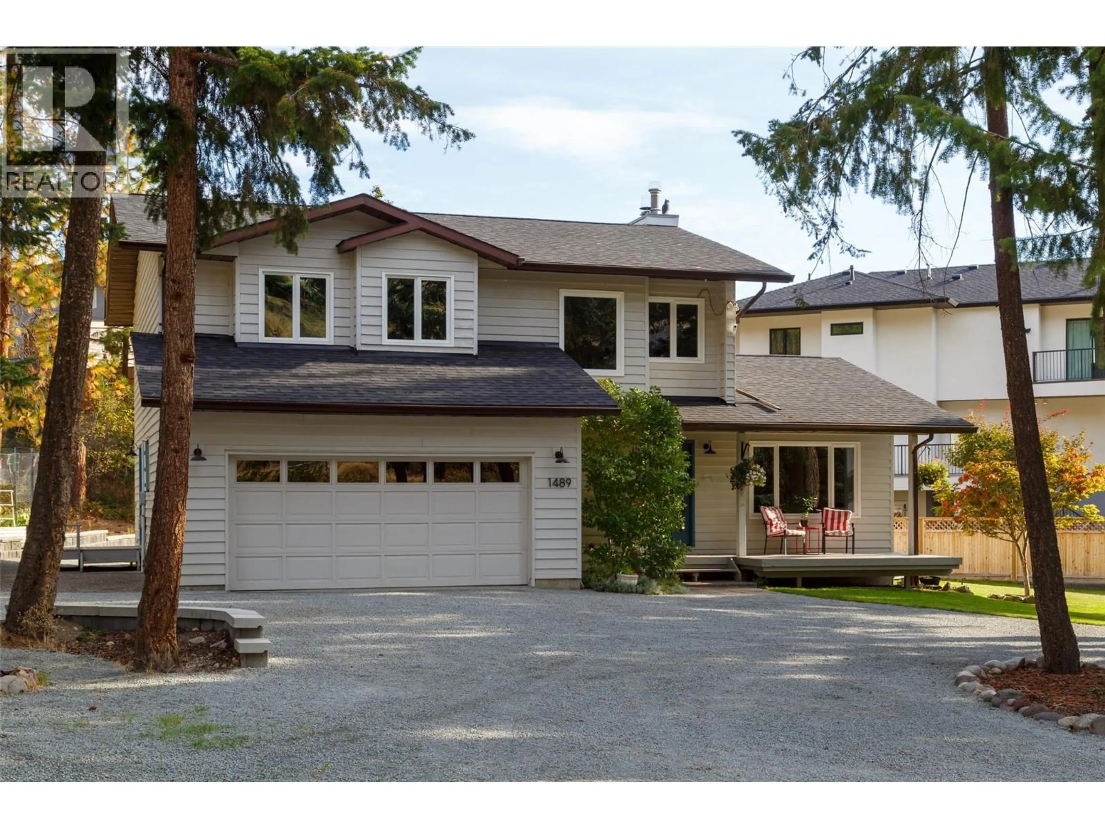 Home with vinyl exterior material, street for 1489 BEAR CREEK ROAD, West Kelowna British Columbia V1Z2S2