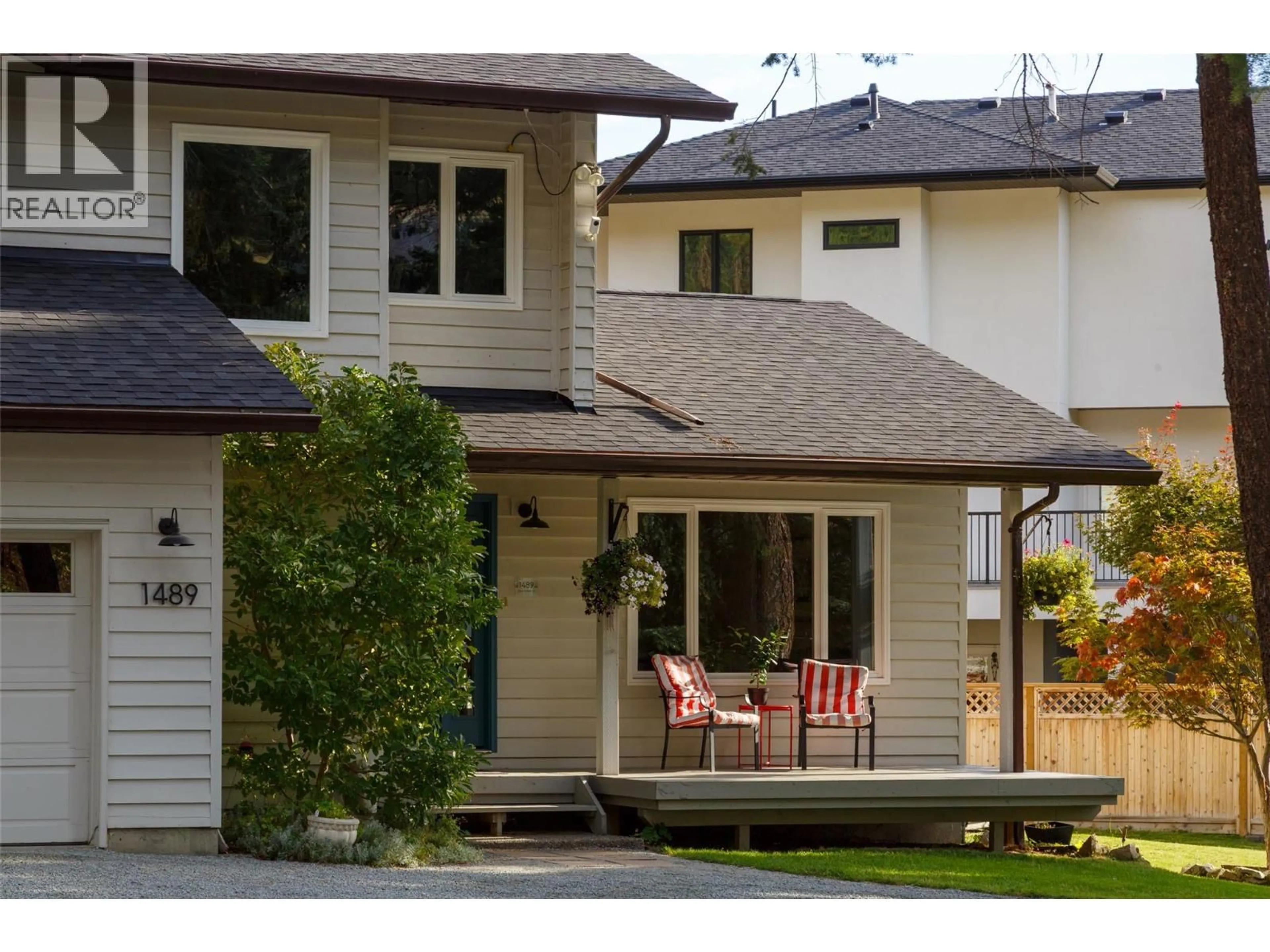 Home with vinyl exterior material, street for 1489 BEAR CREEK ROAD, West Kelowna British Columbia V1Z2S2