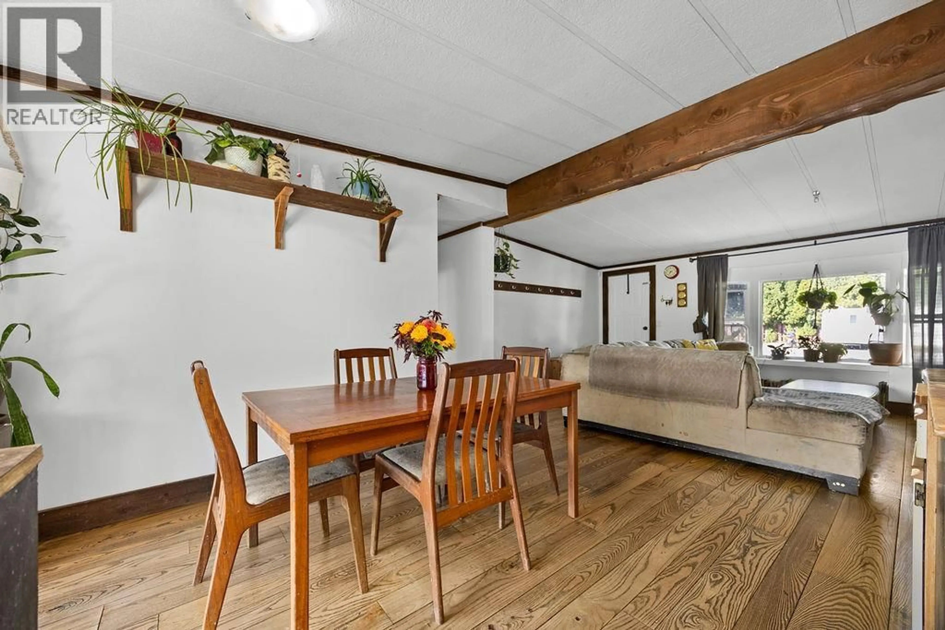Dining room, wood/laminate floor for 18 - 3495 ADAIR STREET, Armstrong British Columbia V4Y0J6