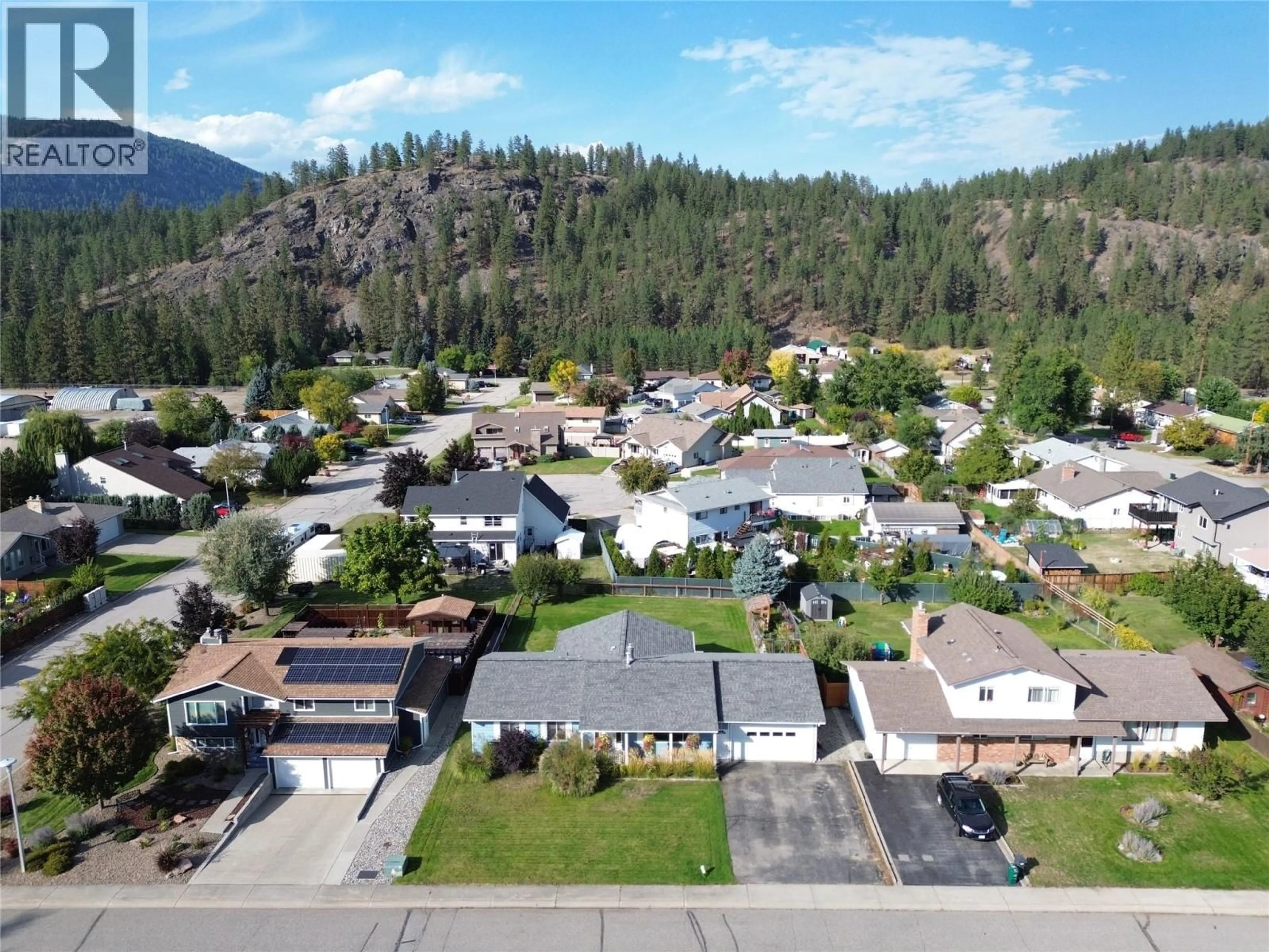 A pic from outside/outdoor area/front of a property/back of a property/a pic from drone, mountain view for 1865 78TH AVENUE, Grand Forks British Columbia V0H1H2