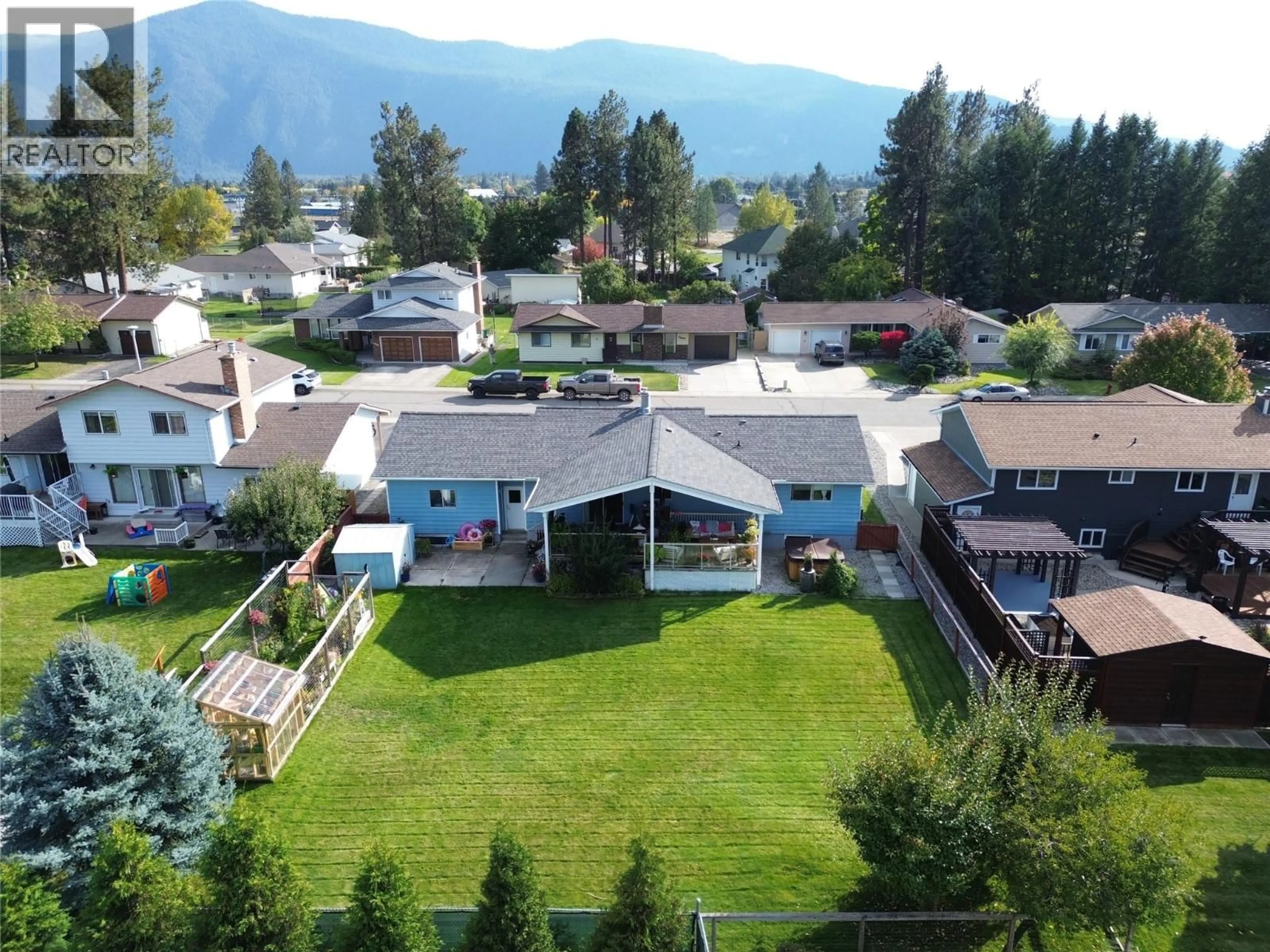 A pic from outside/outdoor area/front of a property/back of a property/a pic from drone, mountain view for 1865 78TH AVENUE, Grand Forks British Columbia V0H1H2