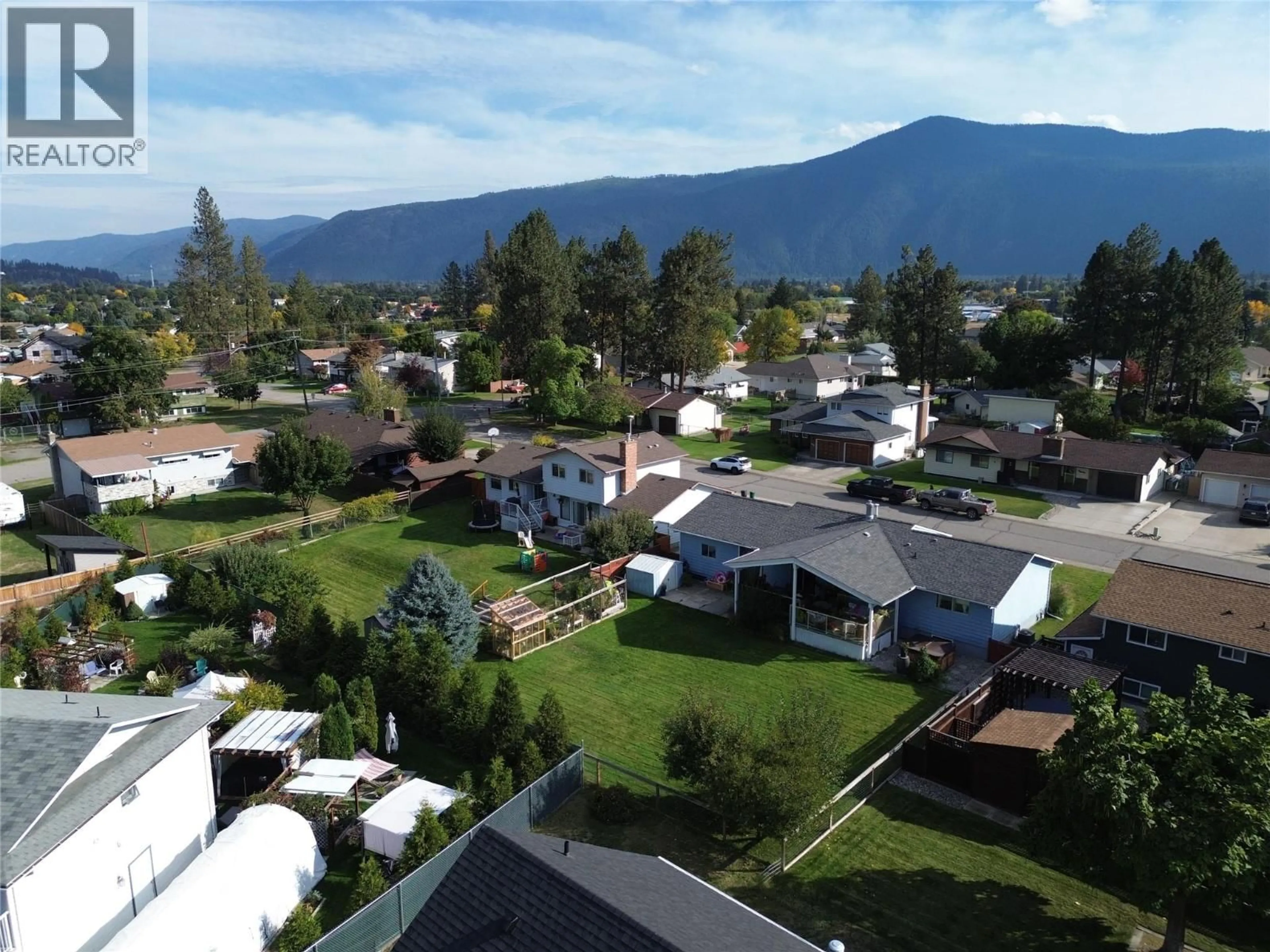 A pic from outside/outdoor area/front of a property/back of a property/a pic from drone, mountain view for 1865 78TH AVENUE, Grand Forks British Columbia V0H1H2