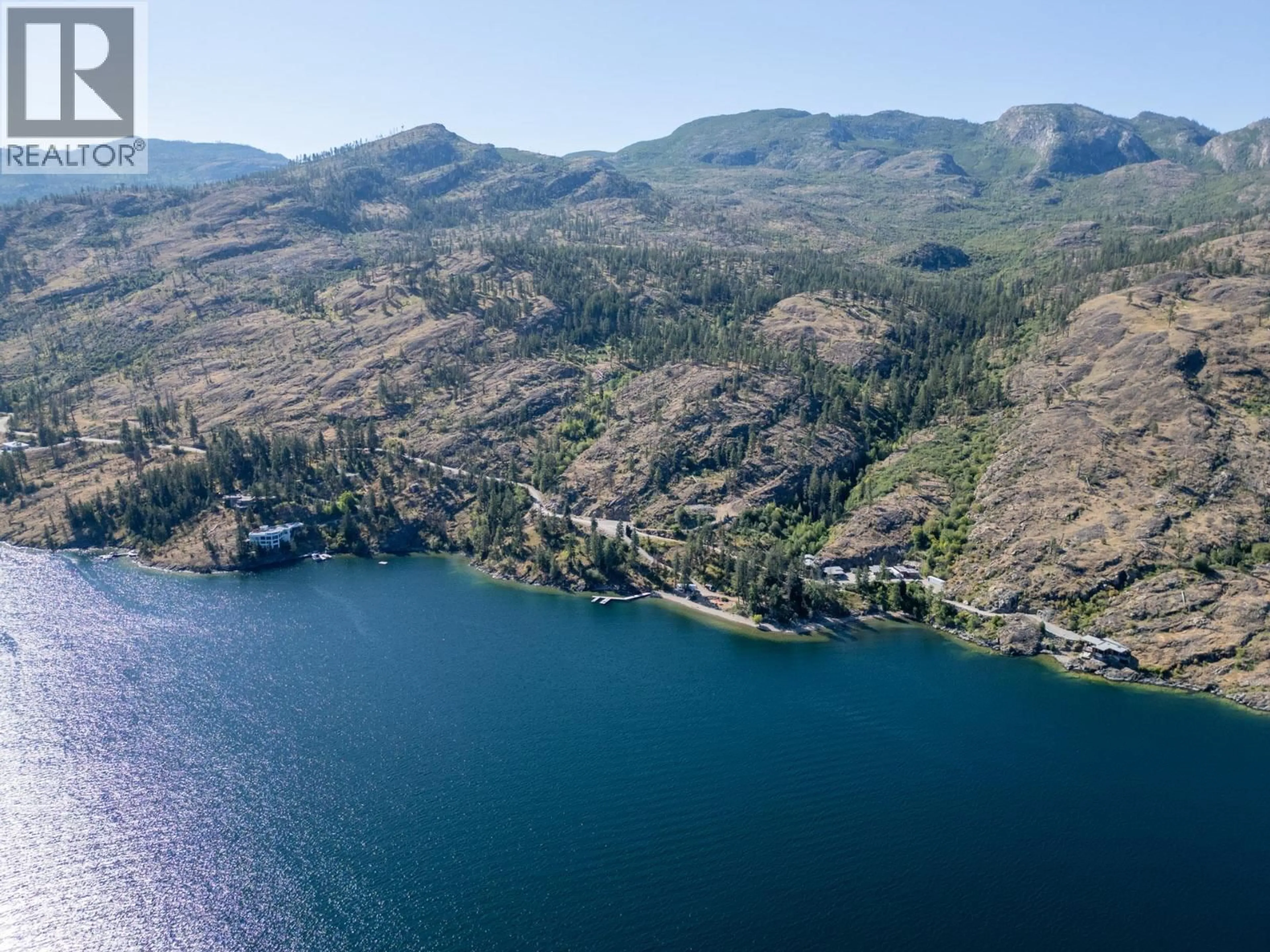 A pic from outside/outdoor area/front of a property/back of a property/a pic from drone, water/lake/river/ocean view for 8888 LAKESHORE ROAD, Kelowna British Columbia V1W4J5