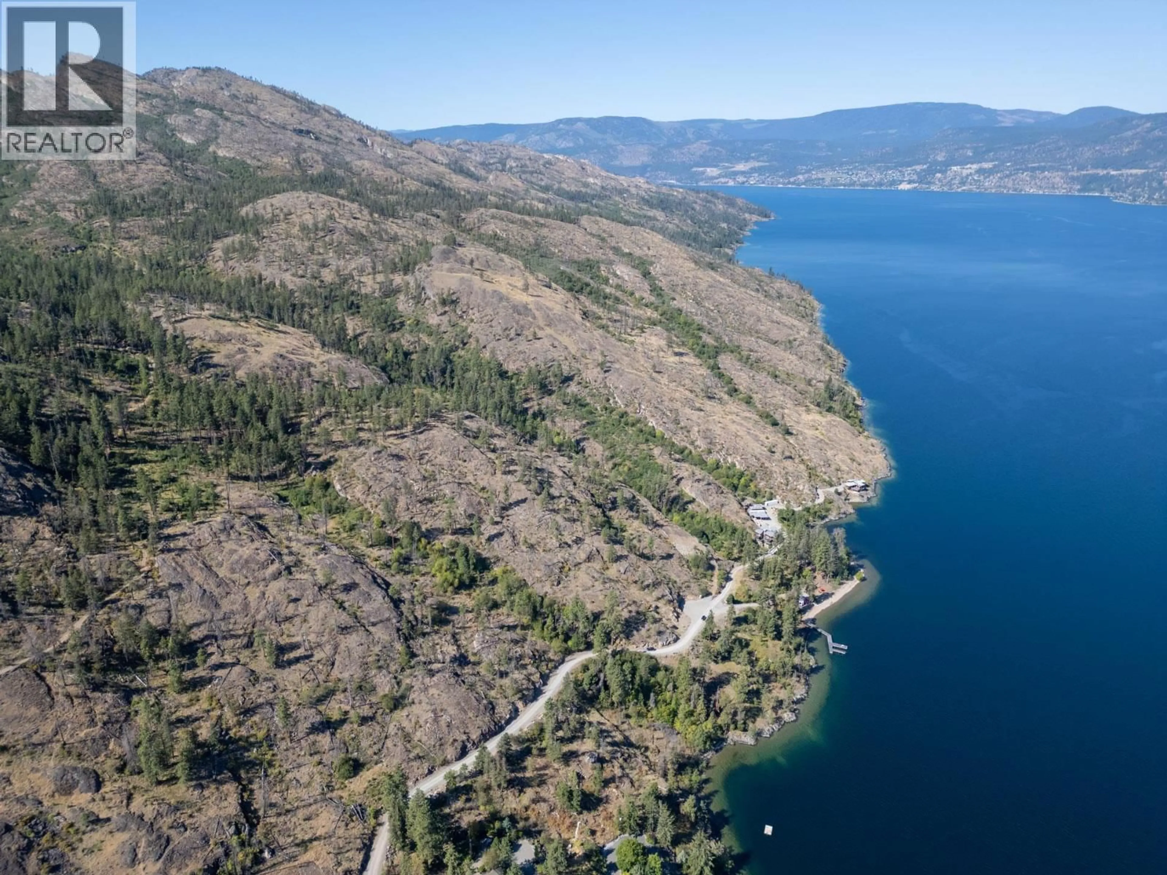 A pic from outside/outdoor area/front of a property/back of a property/a pic from drone, water/lake/river/ocean view for 8888 LAKESHORE ROAD, Kelowna British Columbia V1W4J5