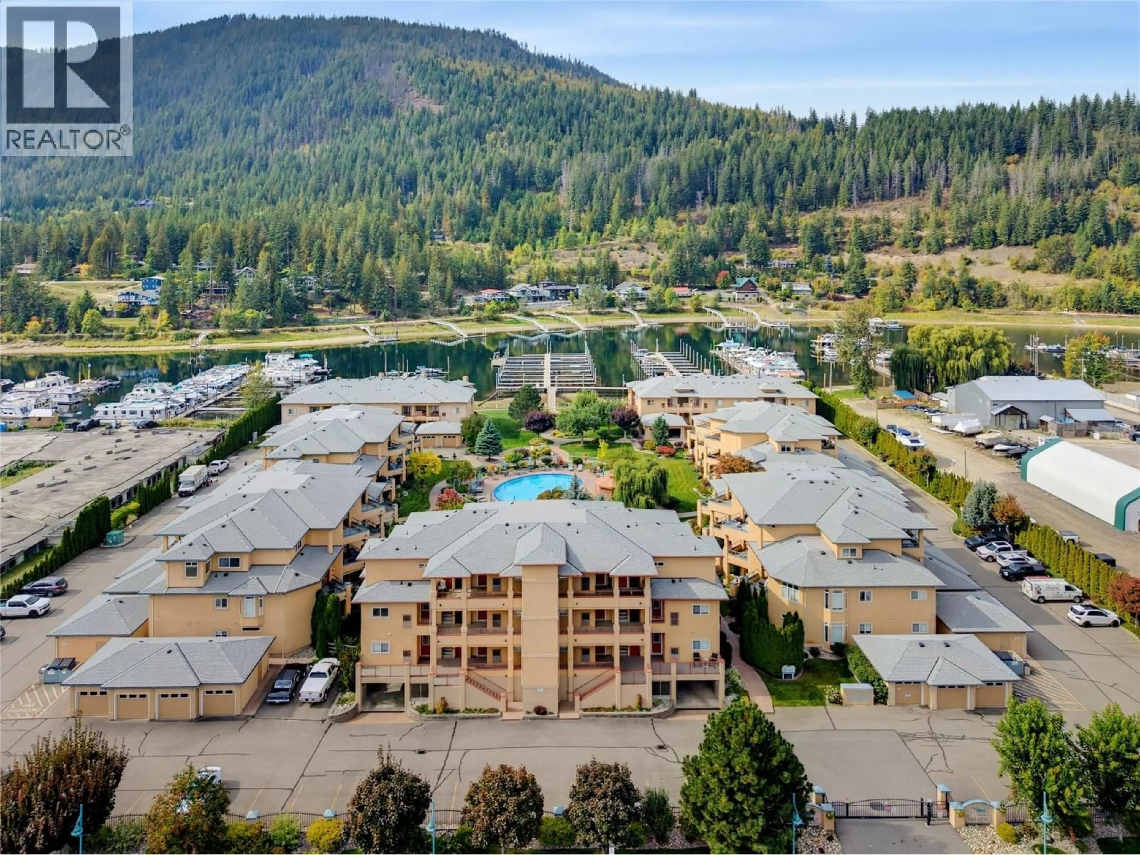 A pic from outside/outdoor area/front of a property/back of a property/a pic from drone, mountain view for 47 - 714 RIVERSIDE AVENUE, Sicamous British Columbia V0E2V1