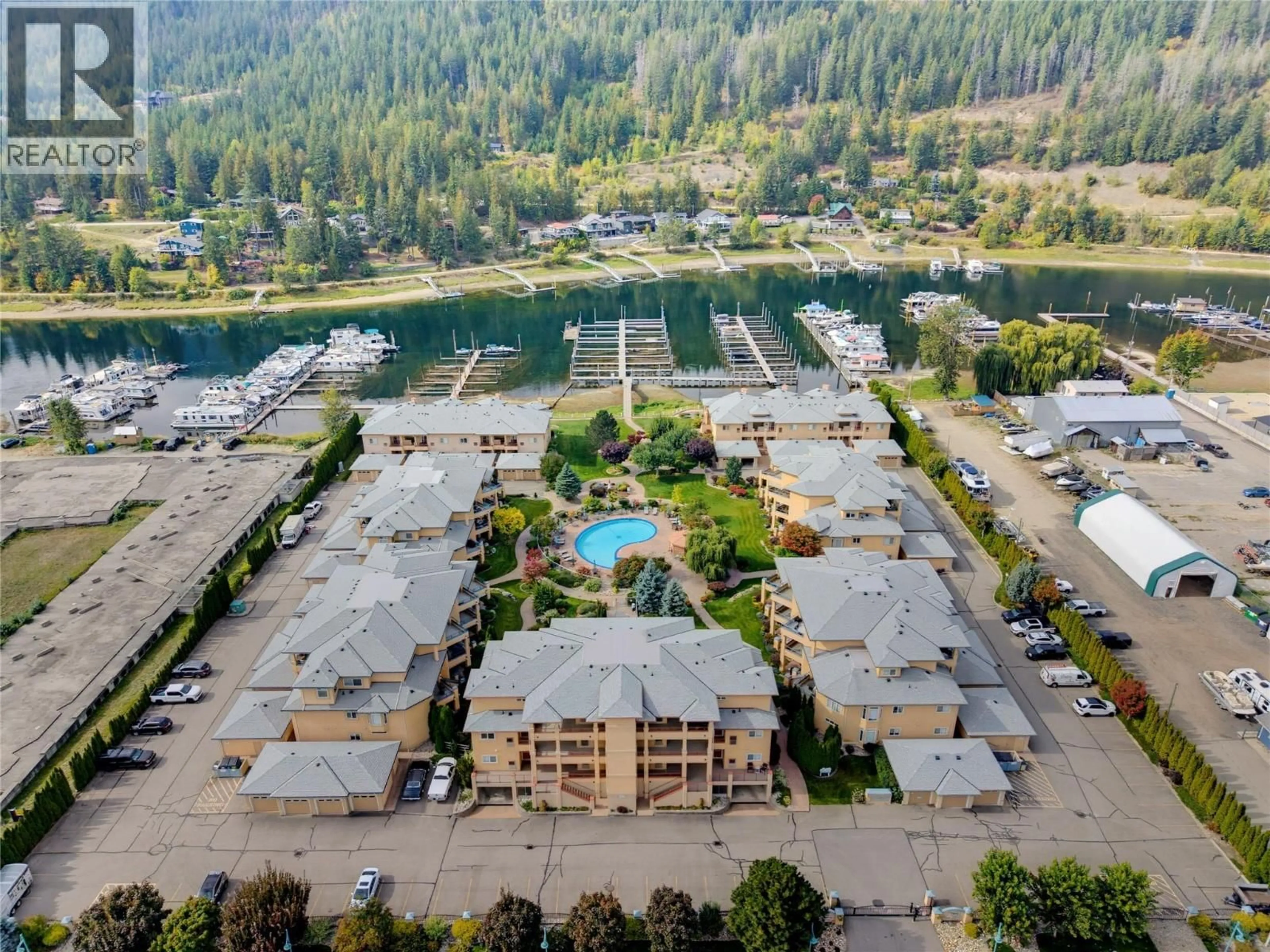 A pic from outside/outdoor area/front of a property/back of a property/a pic from drone, water/lake/river/ocean view for 47 - 714 RIVERSIDE AVENUE, Sicamous British Columbia V0E2V1