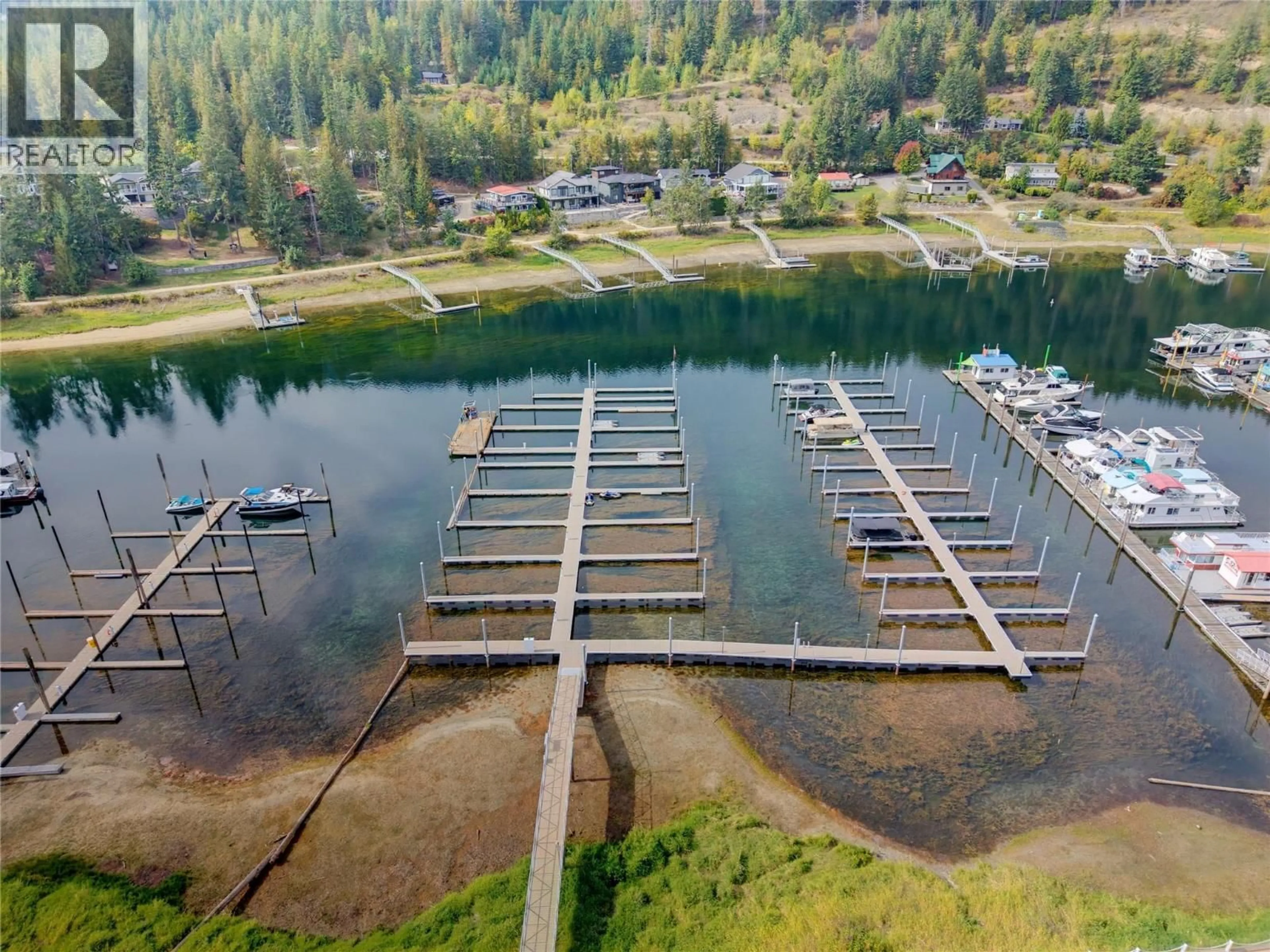 A pic from outside/outdoor area/front of a property/back of a property/a pic from drone, water/lake/river/ocean view for 47 - 714 RIVERSIDE AVENUE, Sicamous British Columbia V0E2V1