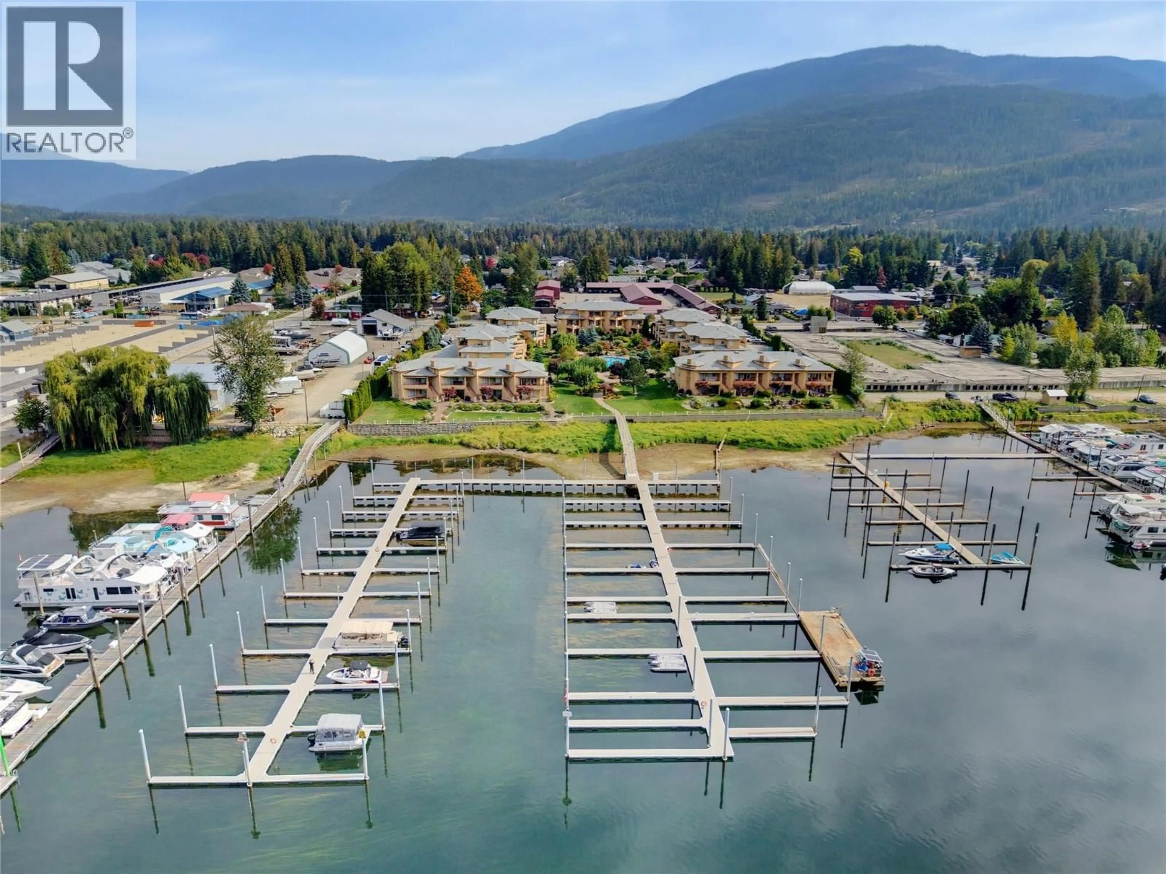 A pic from outside/outdoor area/front of a property/back of a property/a pic from drone, water/lake/river/ocean view for 47 - 714 RIVERSIDE AVENUE, Sicamous British Columbia V0E2V1