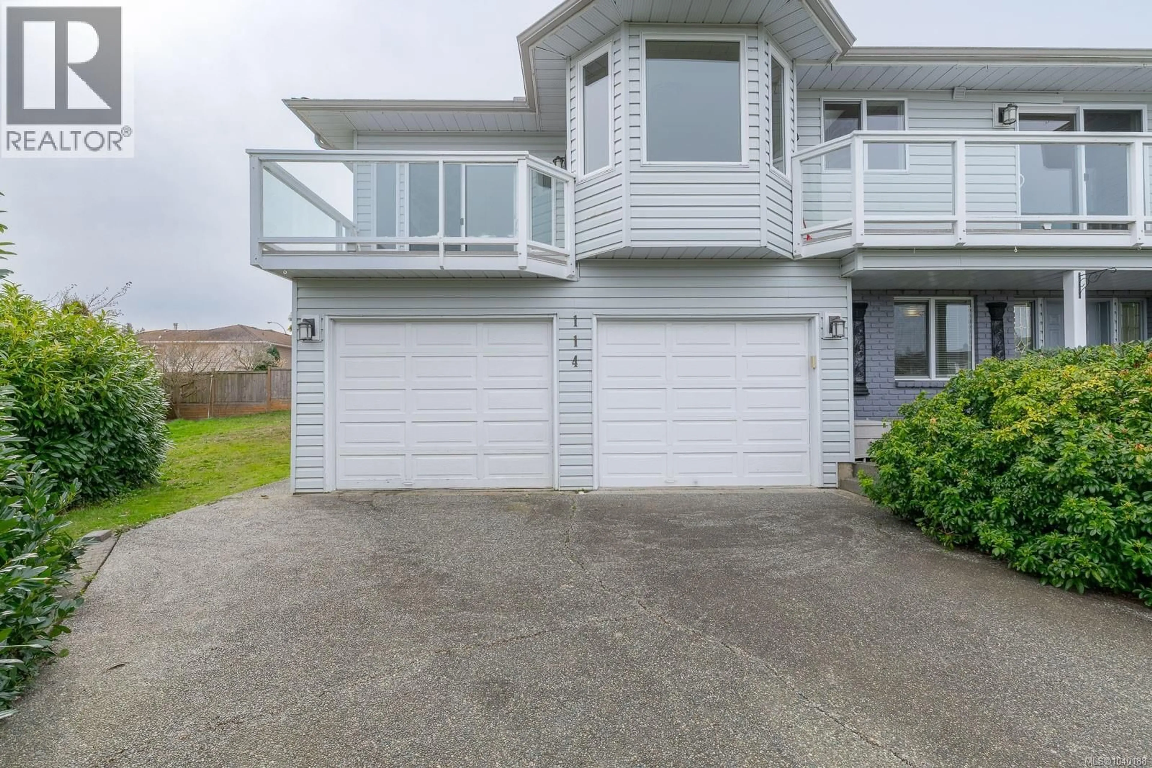 A pic from outside/outdoor area/front of a property/back of a property/a pic from drone, street for 114 NONA PLACE, Nanaimo British Columbia V9V1B6