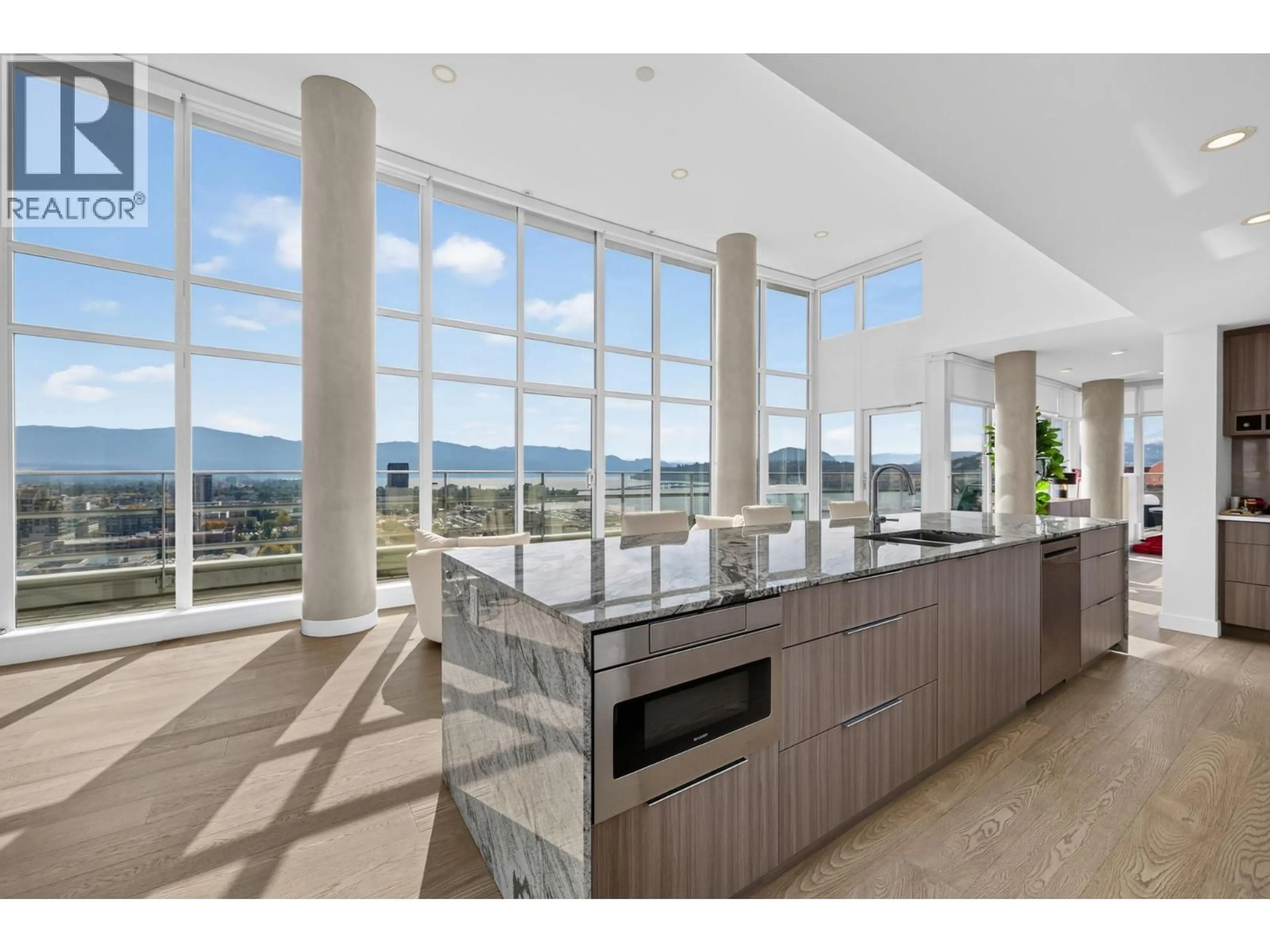 Open concept kitchen, ceramic/tile floor for 2101 - 1151 SUNSET DRIVE, Kelowna British Columbia V1Y0G2