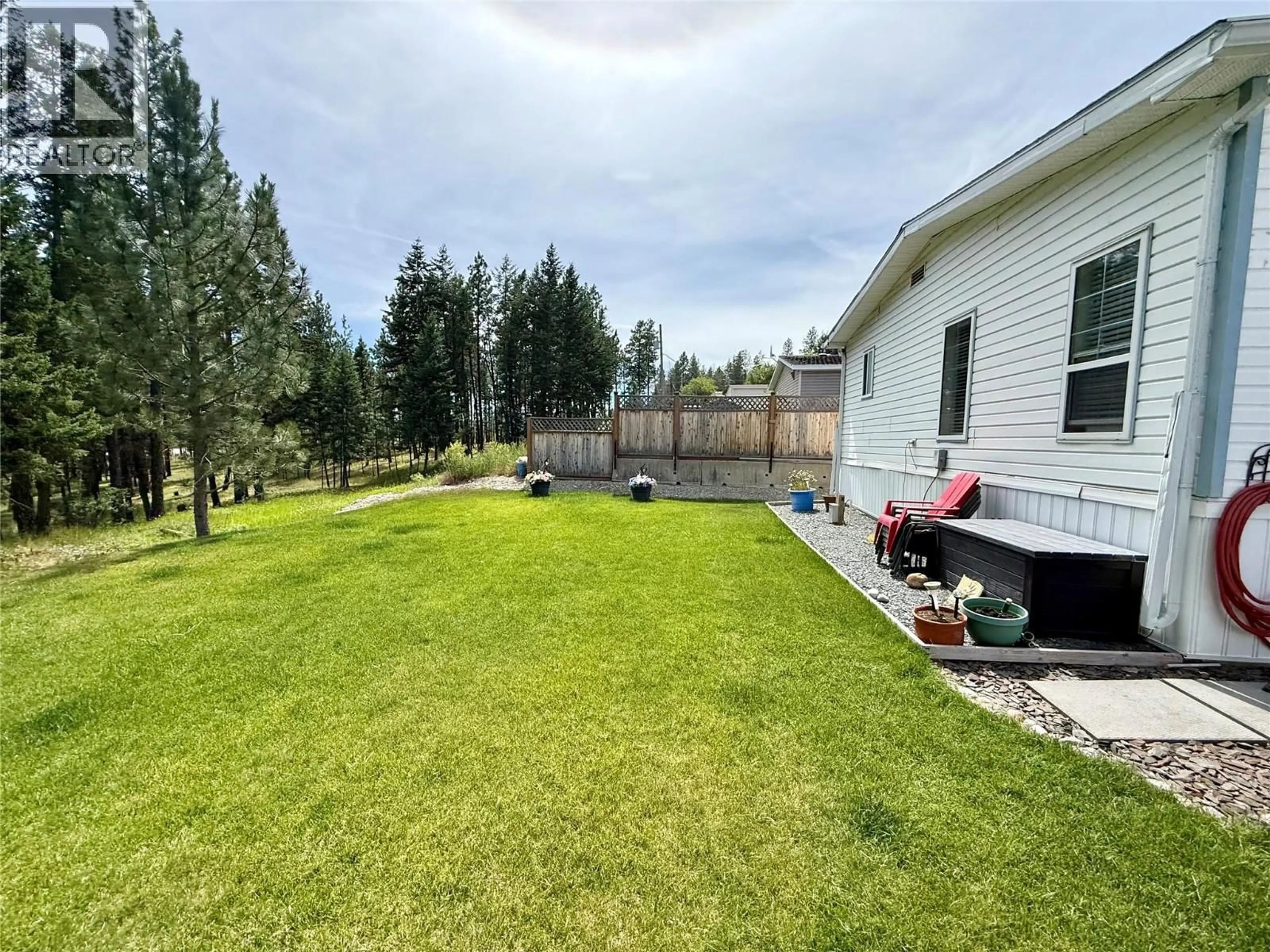 A pic from outside/outdoor area/front of a property/back of a property/a pic from drone, water/lake/river/ocean view for 51 - 700 PATTERSON STREET WEST, Cranbrook British Columbia V1C6T5