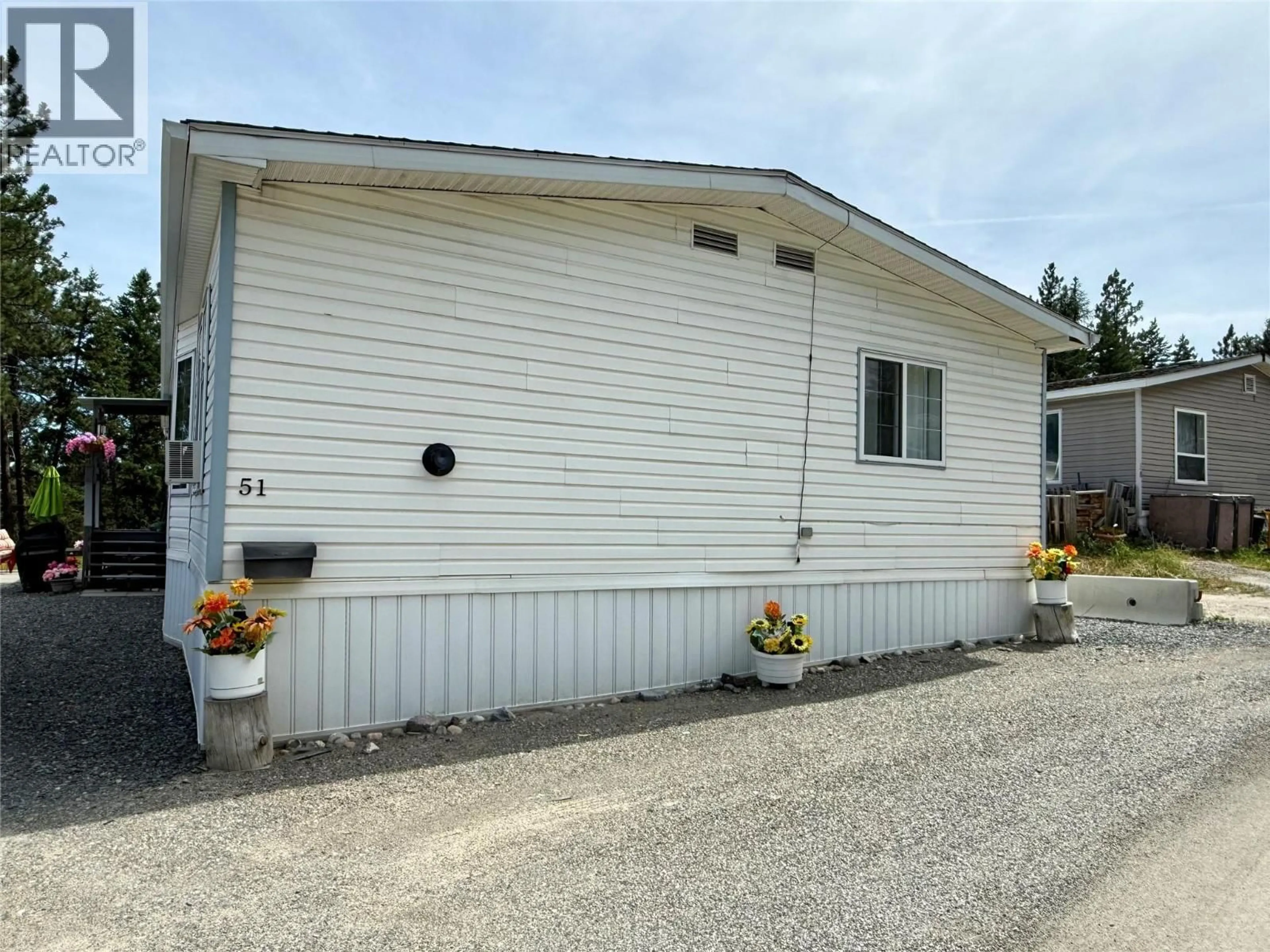 Home with vinyl exterior material, street for 51 - 700 PATTERSON STREET WEST, Cranbrook British Columbia V1C6T5