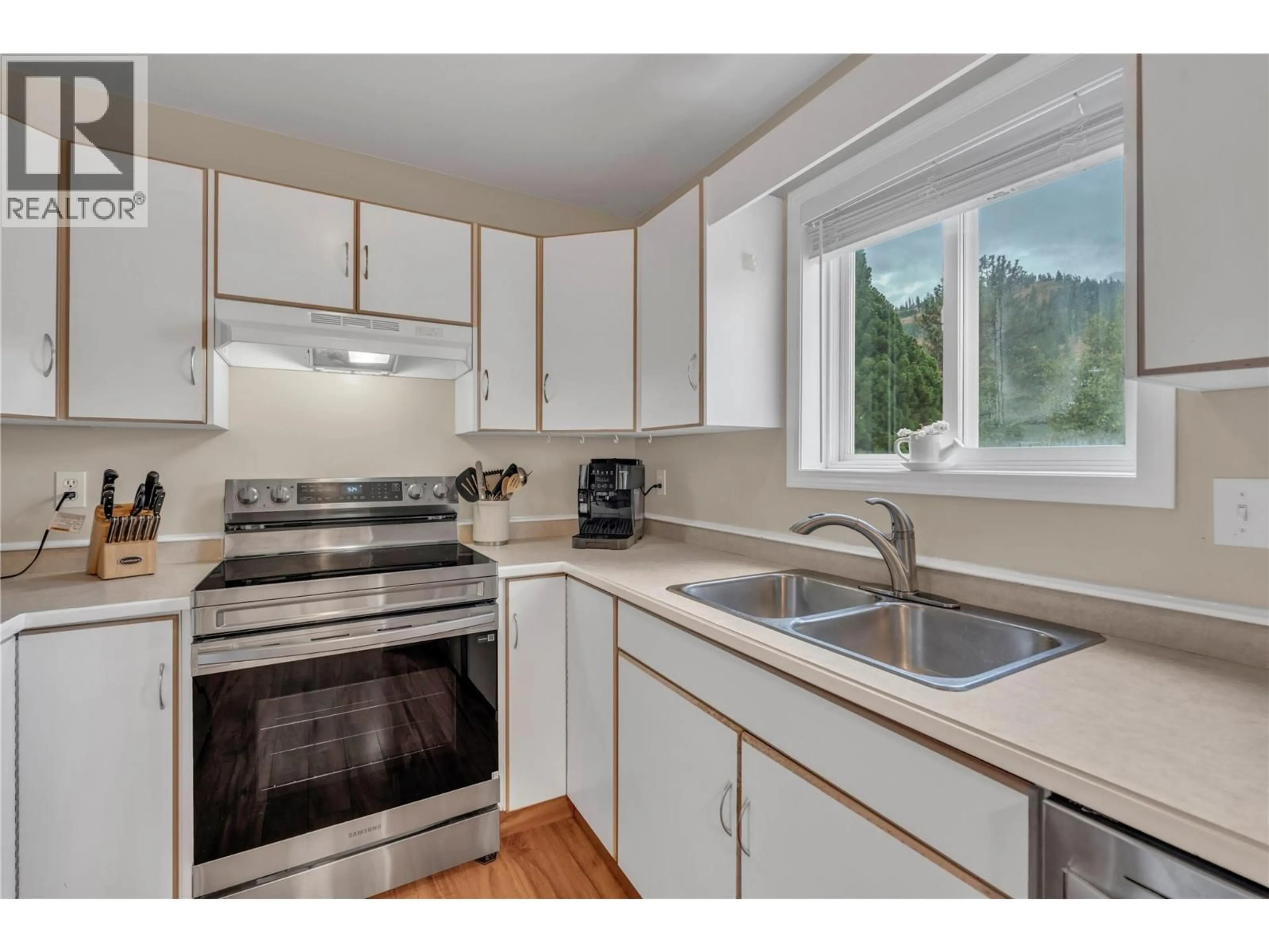 Standard kitchen, wood/laminate floor for 4 - 8710 PRAIRIE VALLEY ROAD, Summerland British Columbia V0H1Z2