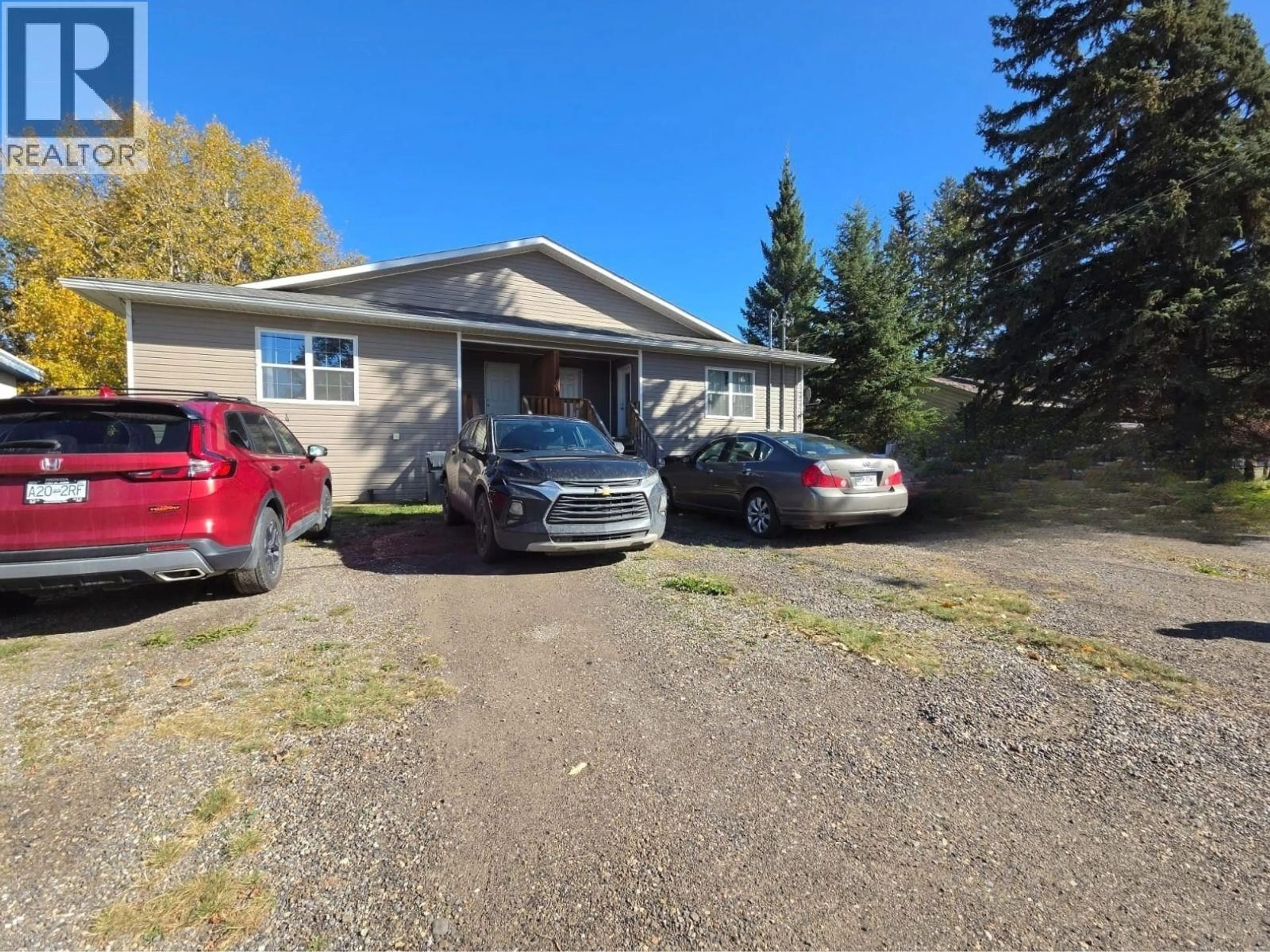 A pic from outside/outdoor area/front of a property/back of a property/a pic from drone, street for 4608 50 AVENUE NORTHEAST, Chetwynd British Columbia V0C1J0