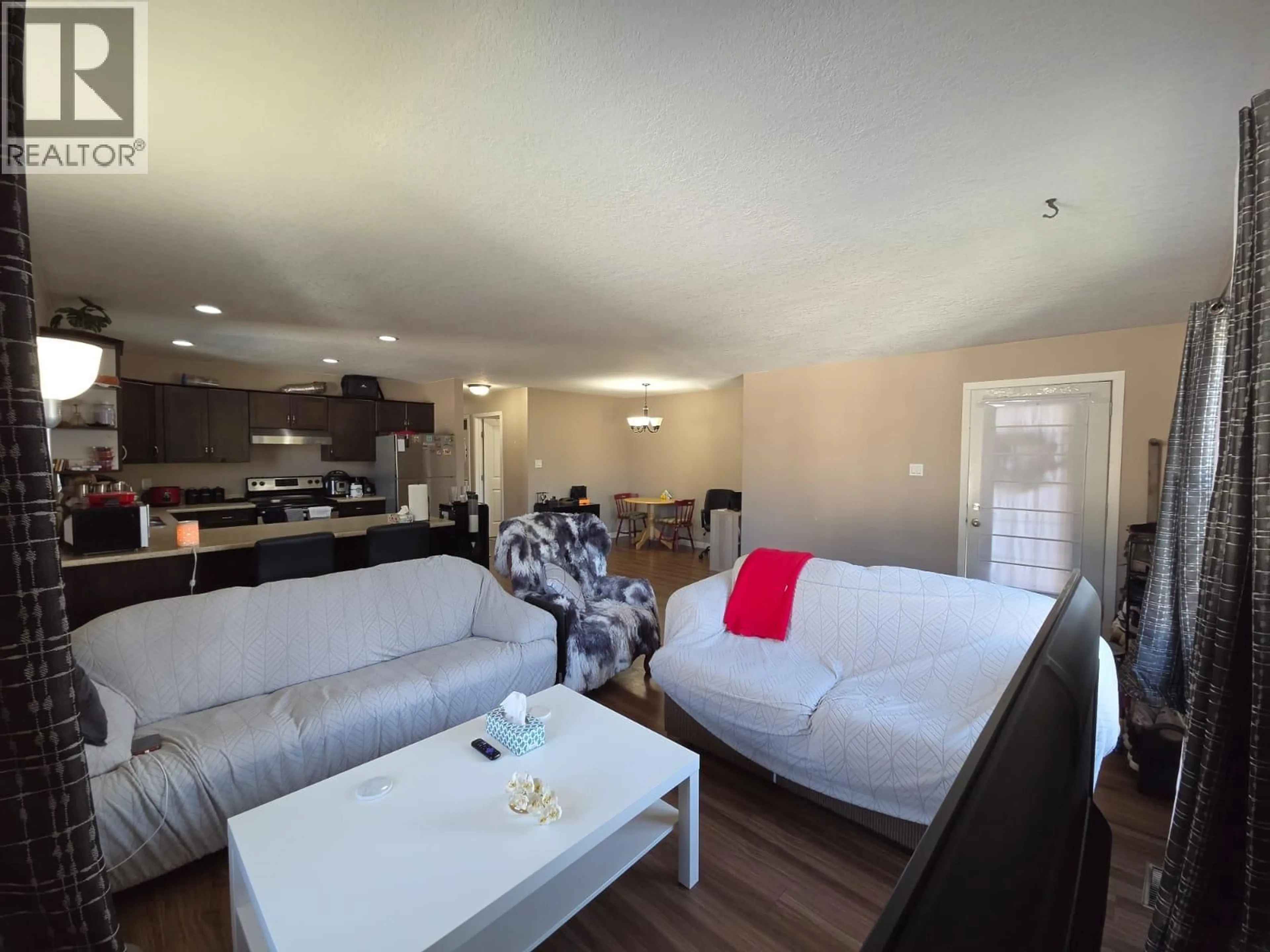 Living room with furniture, unknown for 4608 50 AVENUE NORTHEAST, Chetwynd British Columbia V0C1J0