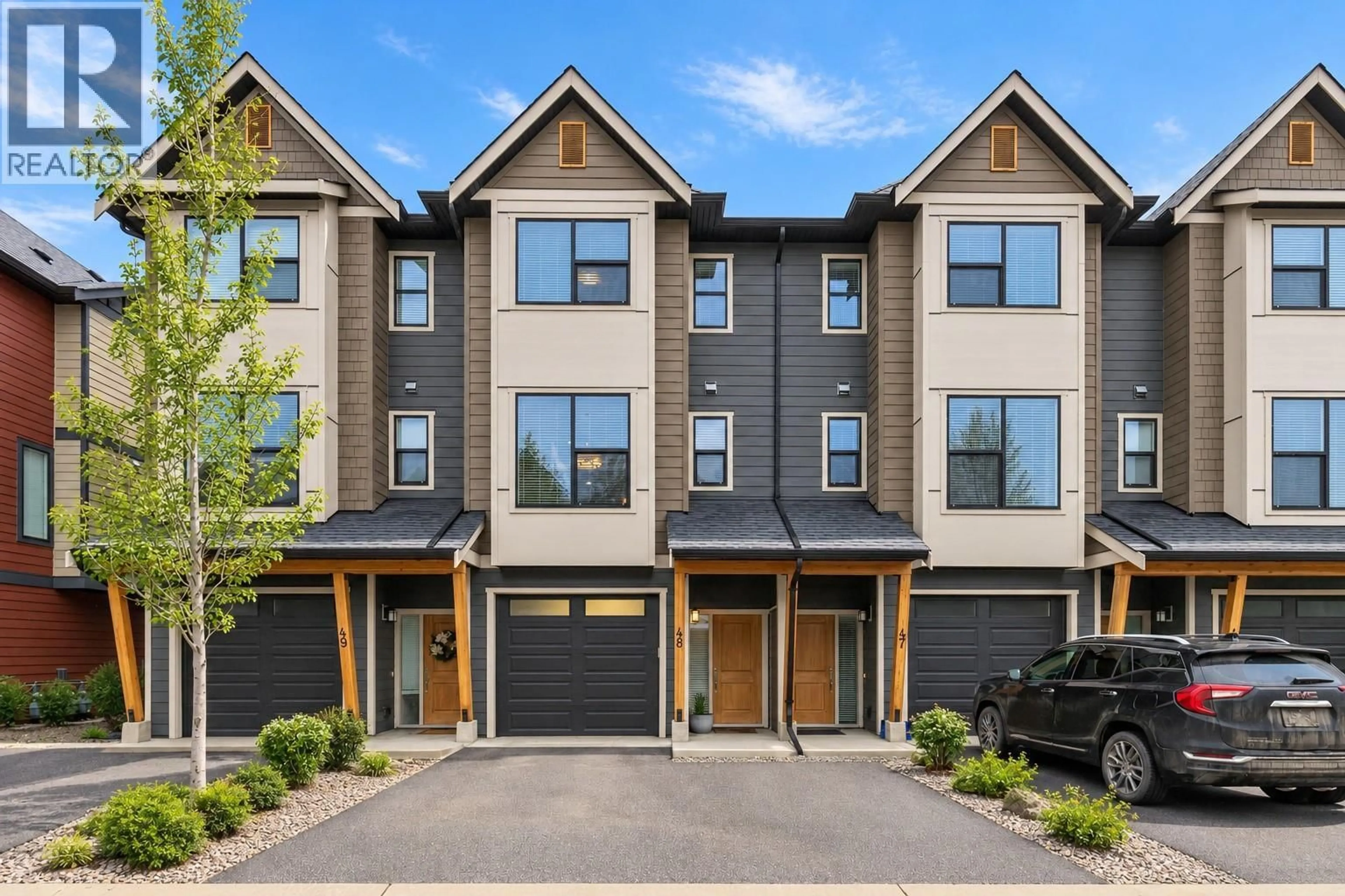 Home with vinyl exterior material, street for 48 - 2490 TUSCANY DRIVE, West Kelowna British Columbia V4T3M4