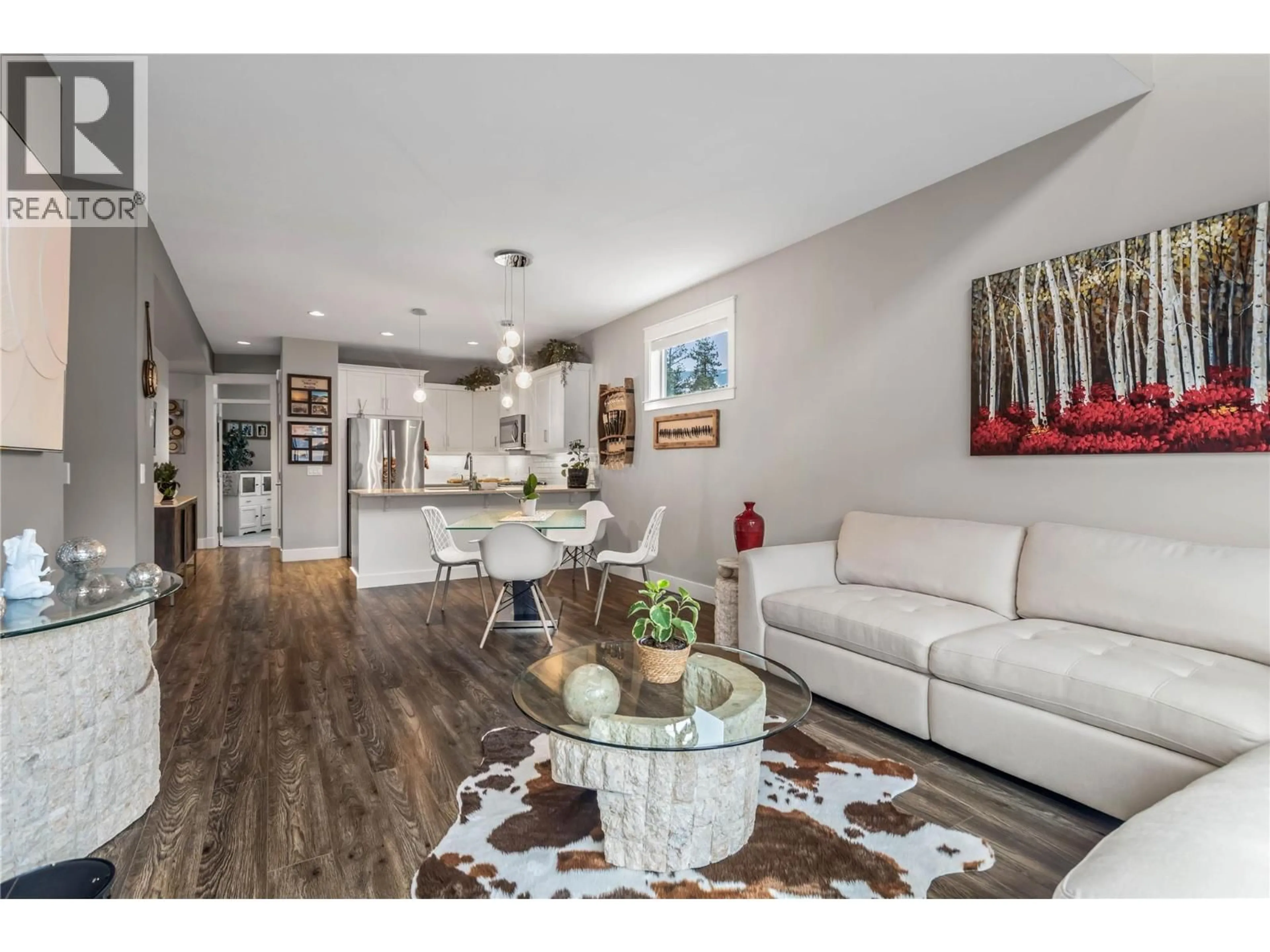 Living room with furniture, wood/laminate floor for 60 - 3359 COUGAR ROAD, West Kelowna British Columbia V4T3G1