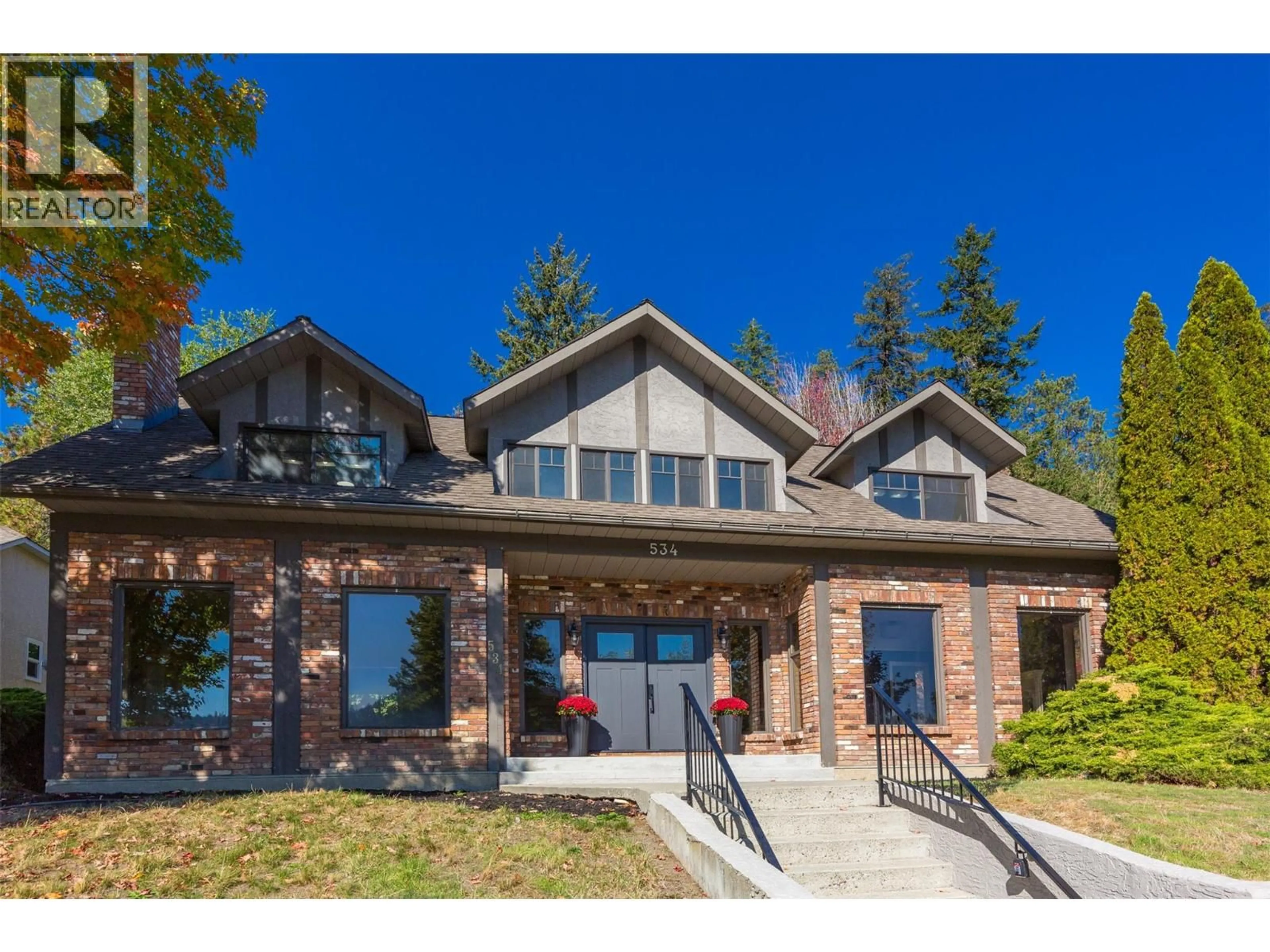Home with brick exterior material, mountain view for 534 GLENMEADOWS ROAD, Kelowna British Columbia V1V1Y7