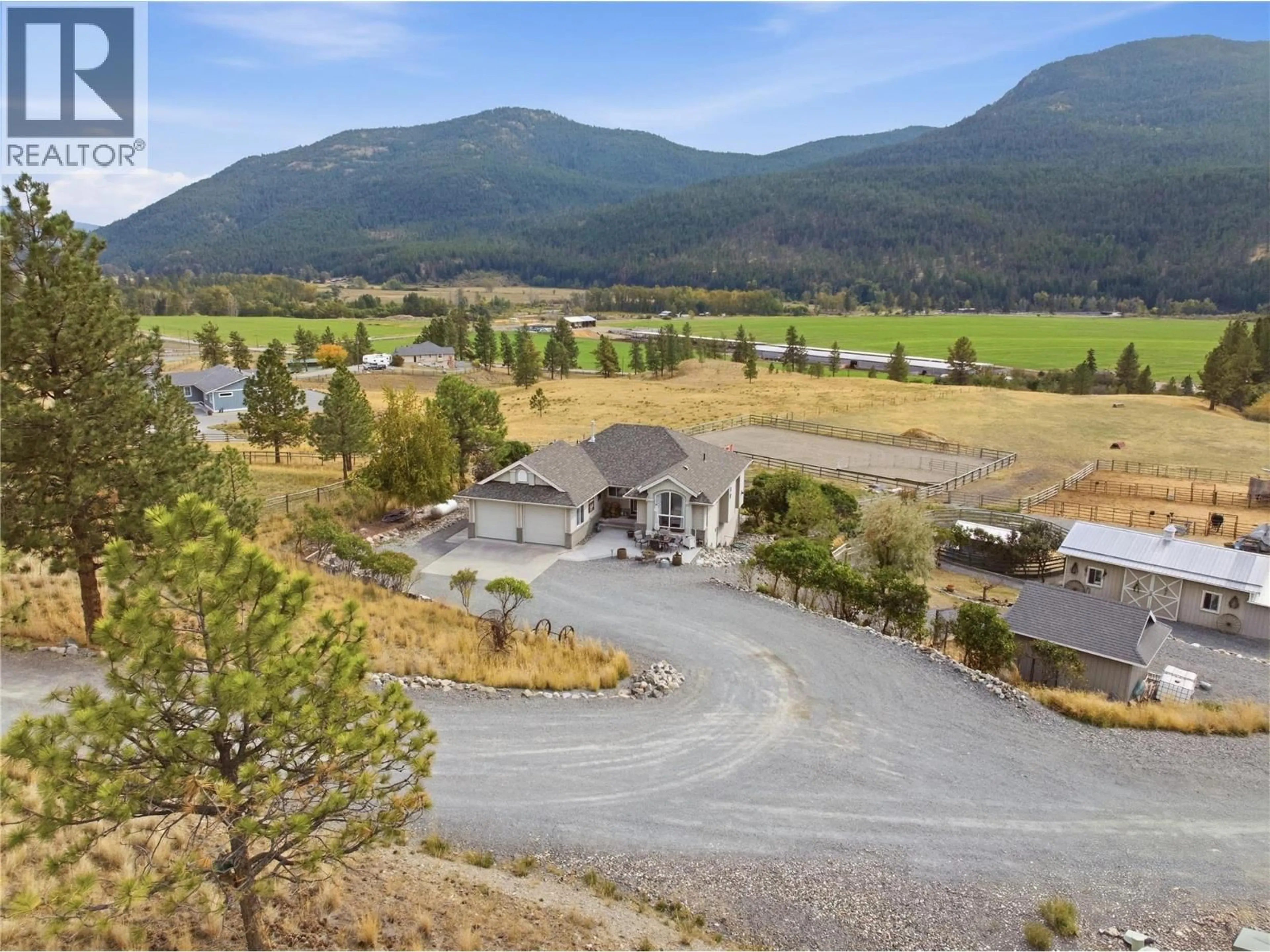 A pic from outside/outdoor area/front of a property/back of a property/a pic from drone, mountain view for 1373 MILLER ROAD, Merritt British Columbia V1K1N6