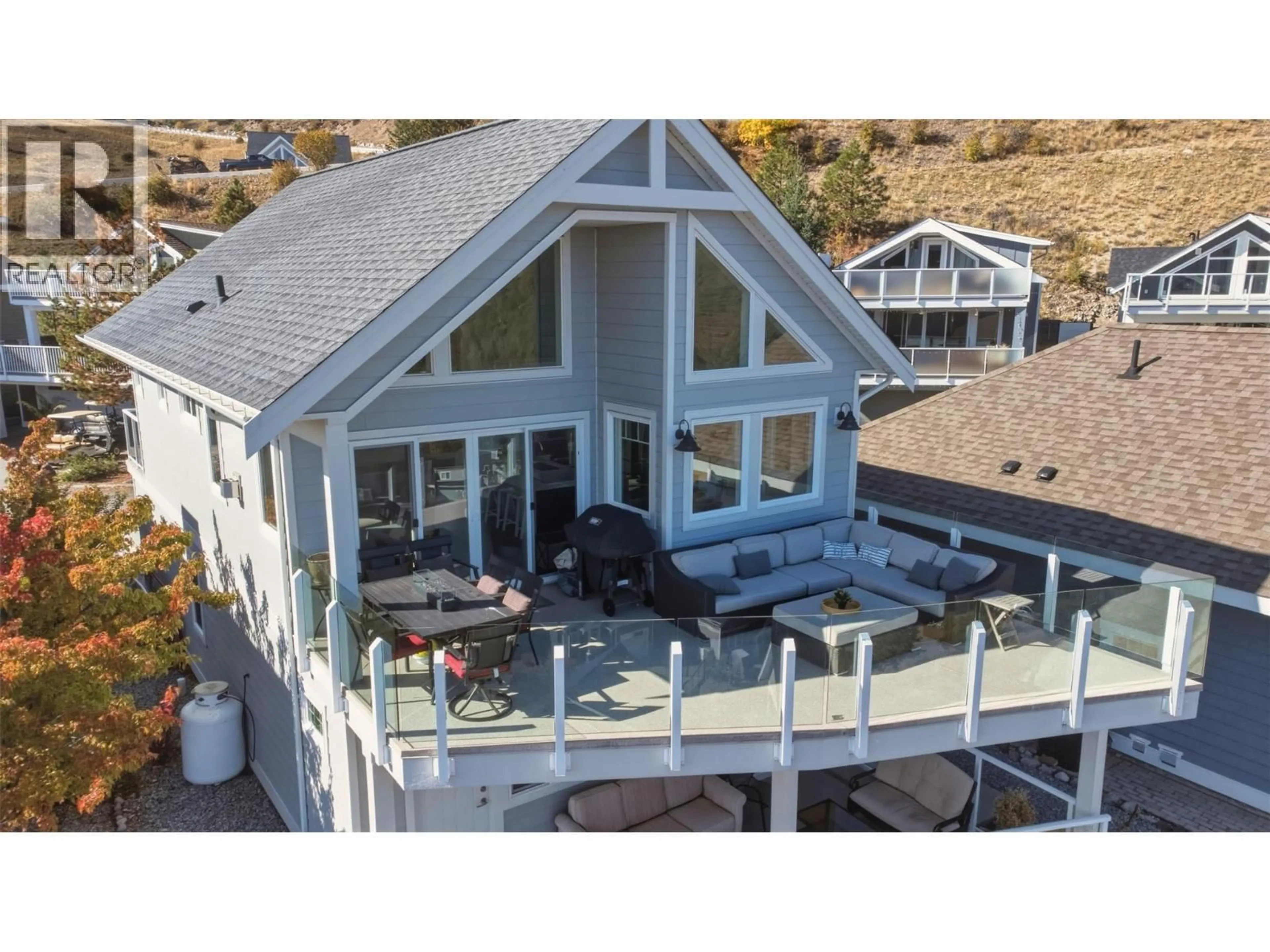 A pic from outside/outdoor area/front of a property/back of a property/a pic from drone, water/lake/river/ocean view for 238 - 6715 LA PALMA LOOP, Kelowna British Columbia V1Z3R8