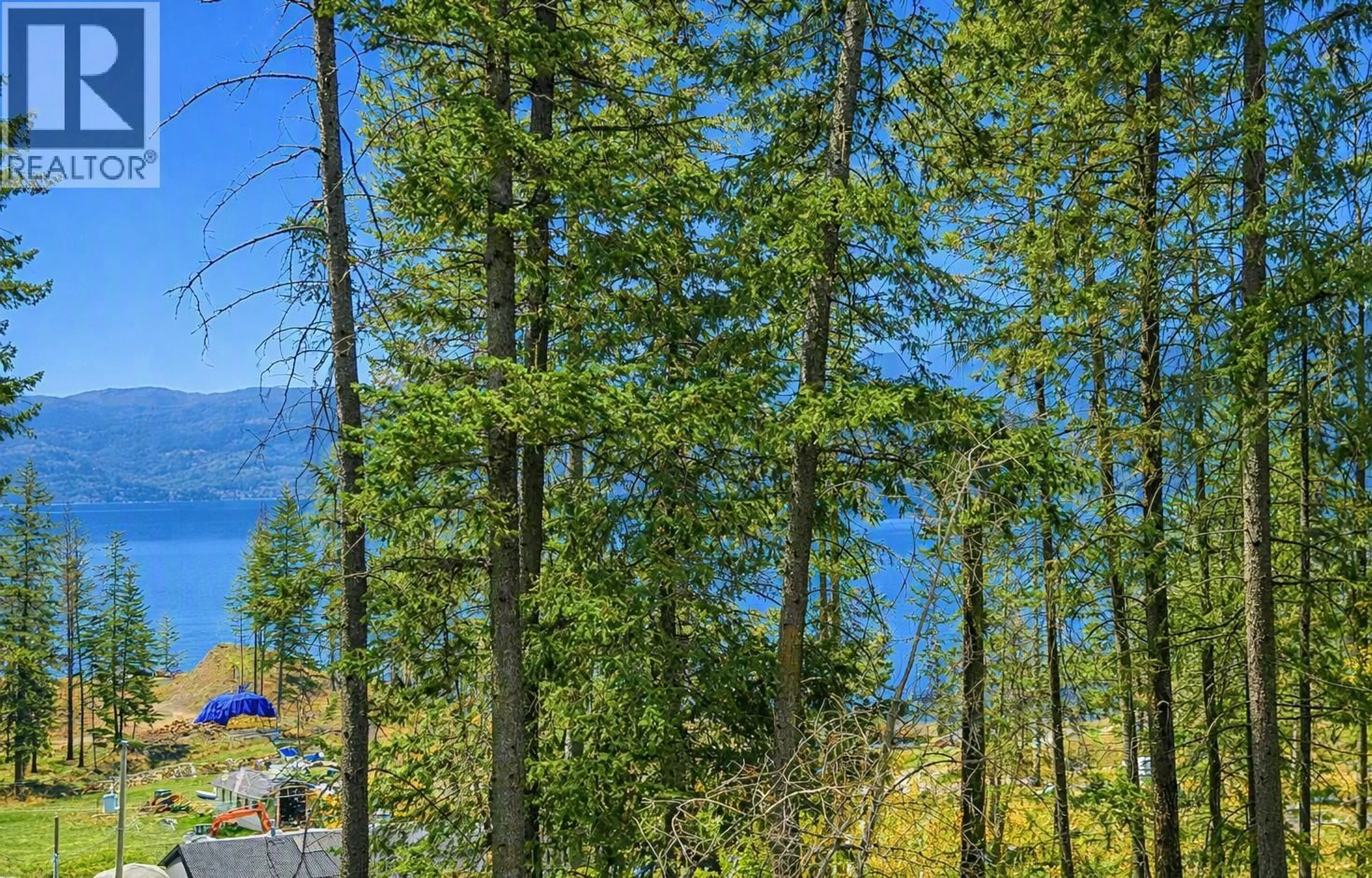 A pic from outside/outdoor area/front of a property/back of a property/a pic from drone, water/lake/river/ocean view for 834 UDELL ROAD, Vernon British Columbia V1H2E3