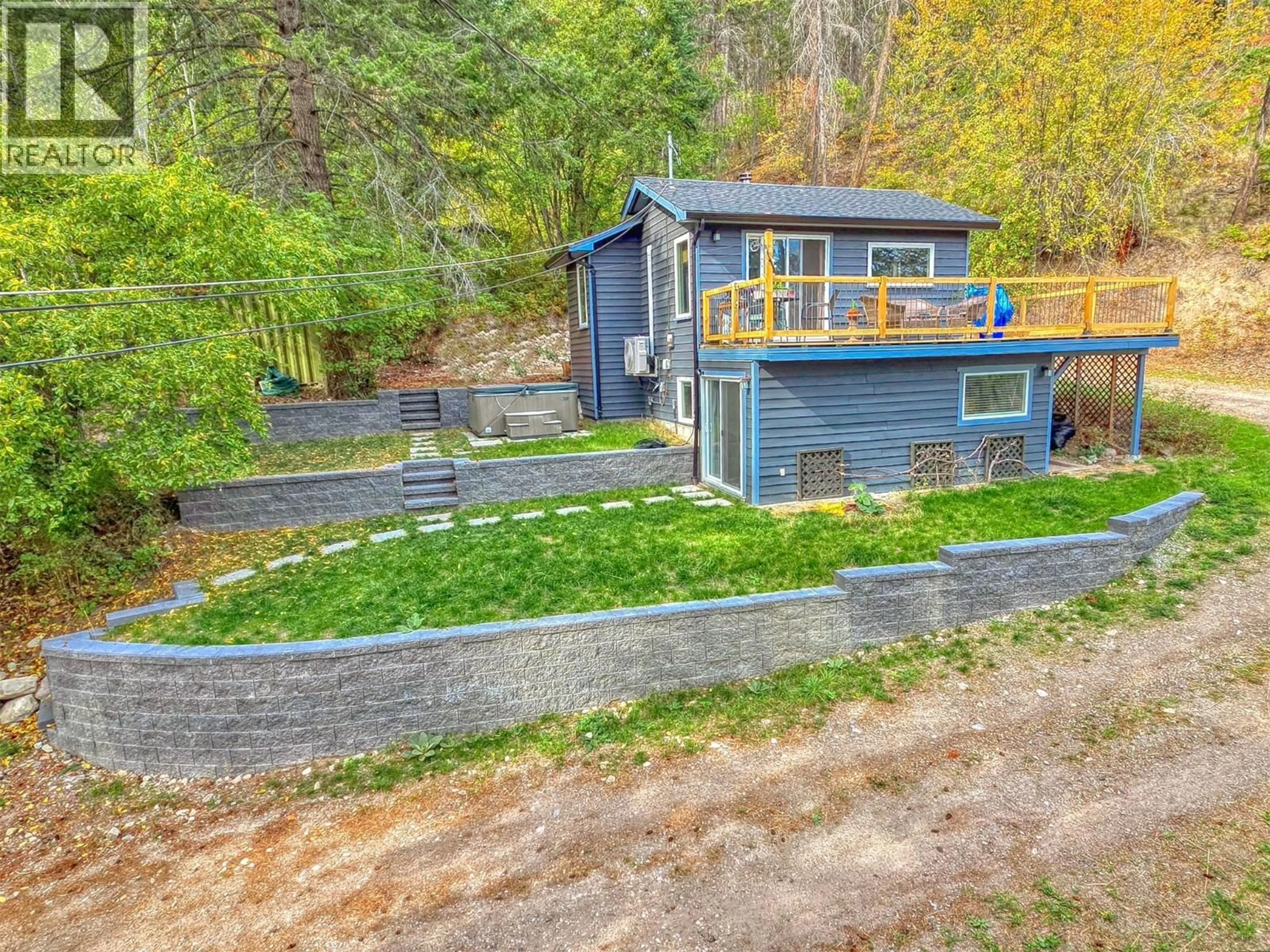 A pic from outside/outdoor area/front of a property/back of a property/a pic from drone, unknown for 834 UDELL ROAD, Vernon British Columbia V1H2E3
