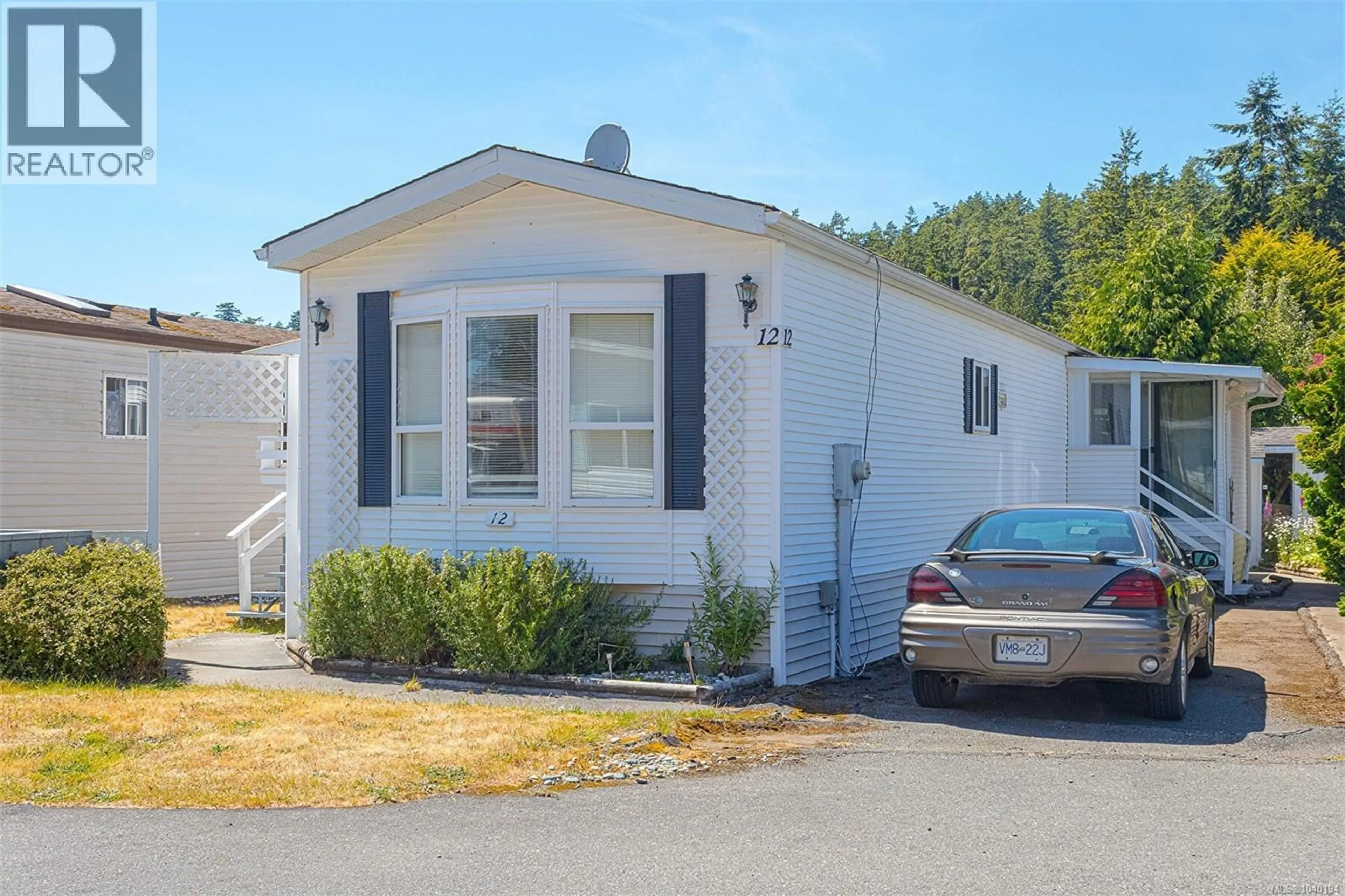 Home with vinyl exterior material, street for 12 - 7871 WEST COAST ROAD, Sooke British Columbia V0S1N0