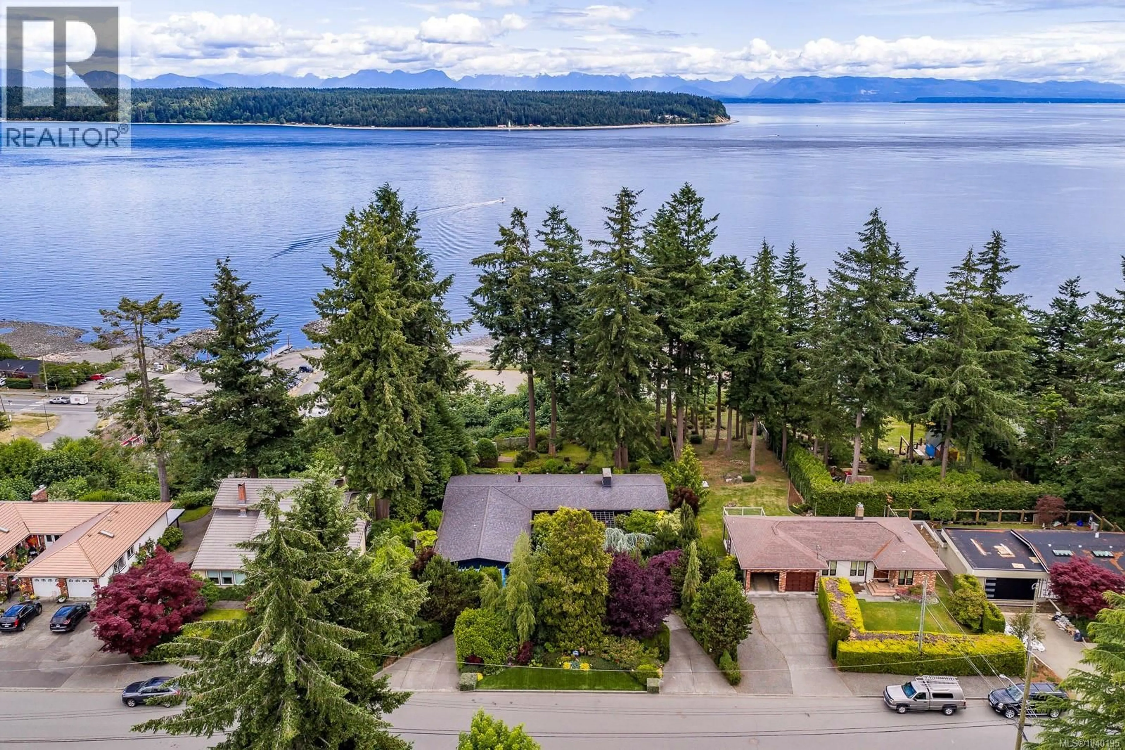 A pic from outside/outdoor area/front of a property/back of a property/a pic from drone, water/lake/river/ocean view for 1093 ASH STREET, Campbell River British Columbia V9W1G6