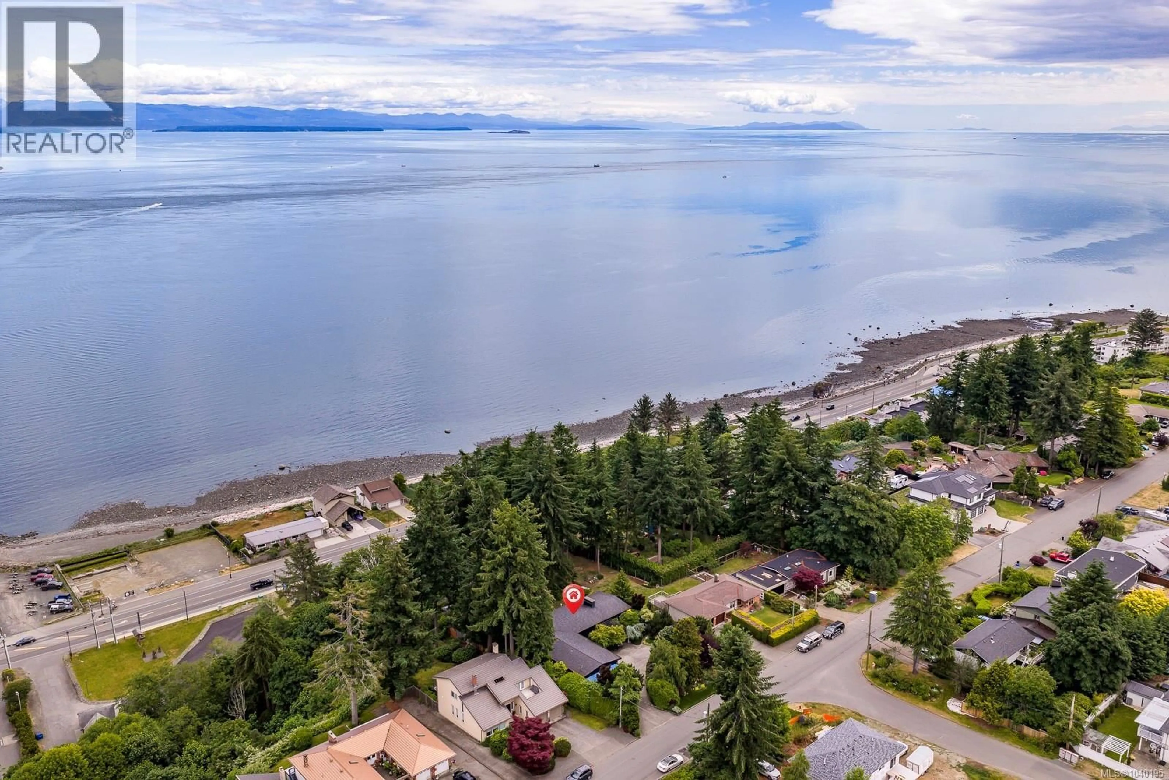 A pic from outside/outdoor area/front of a property/back of a property/a pic from drone, water/lake/river/ocean view for 1093 ASH STREET, Campbell River British Columbia V9W1G6