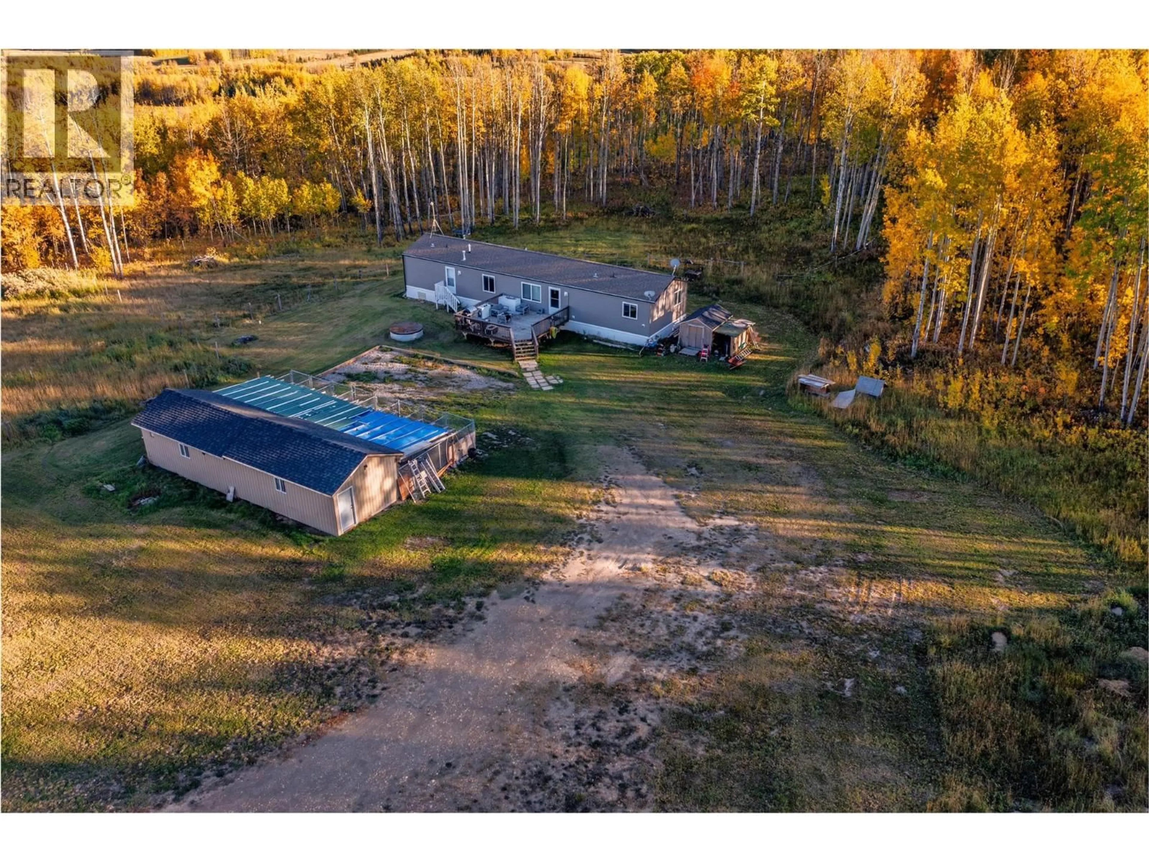 A pic from outside/outdoor area/front of a property/back of a property/a pic from drone, unknown for 10111 253 ROAD, Dawson Creek British Columbia V0C2E0