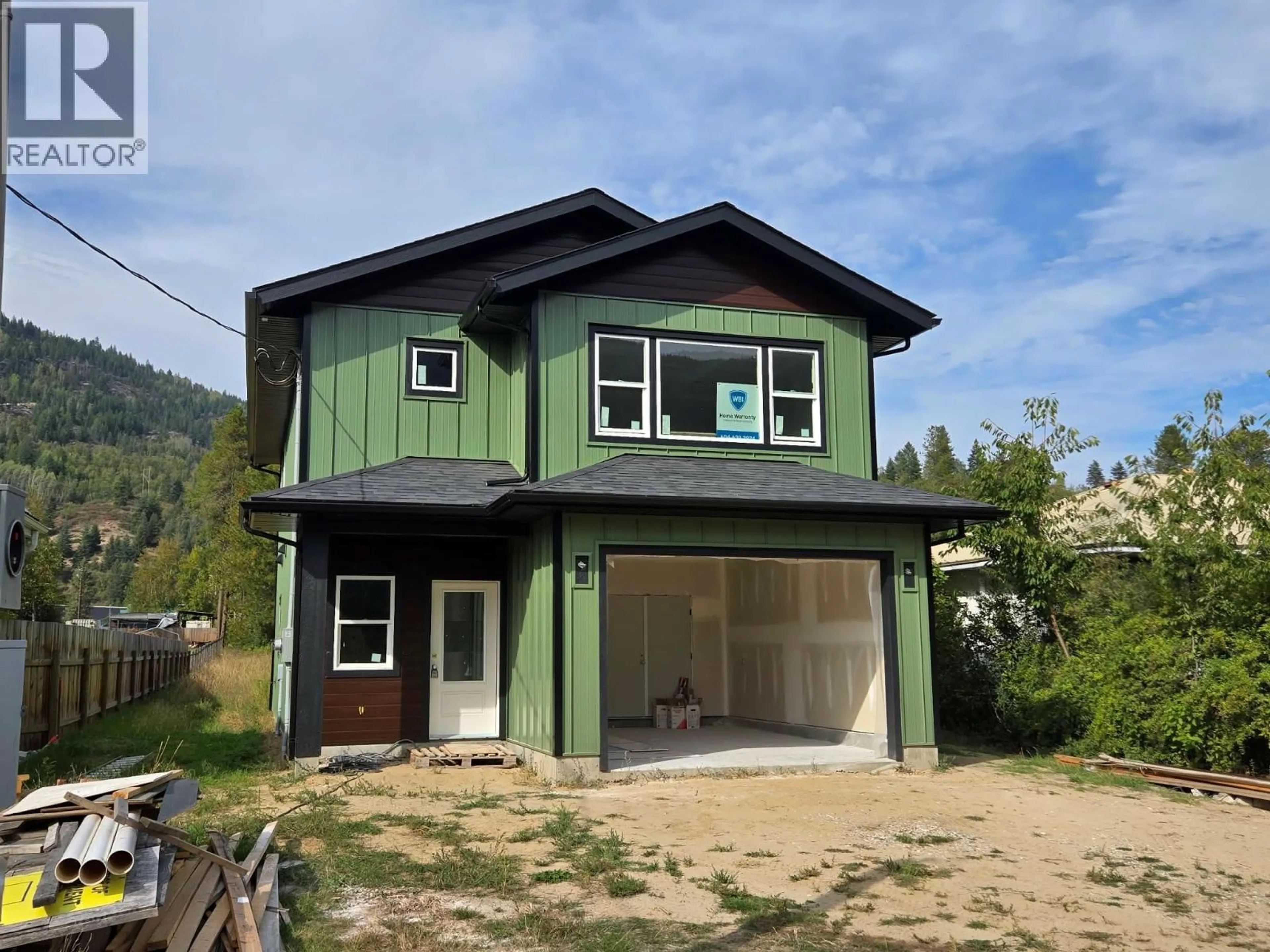 Home with vinyl exterior material, unknown for 209 12TH AVENUE FRONTAGE ROAD, Genelle British Columbia V0G1G0