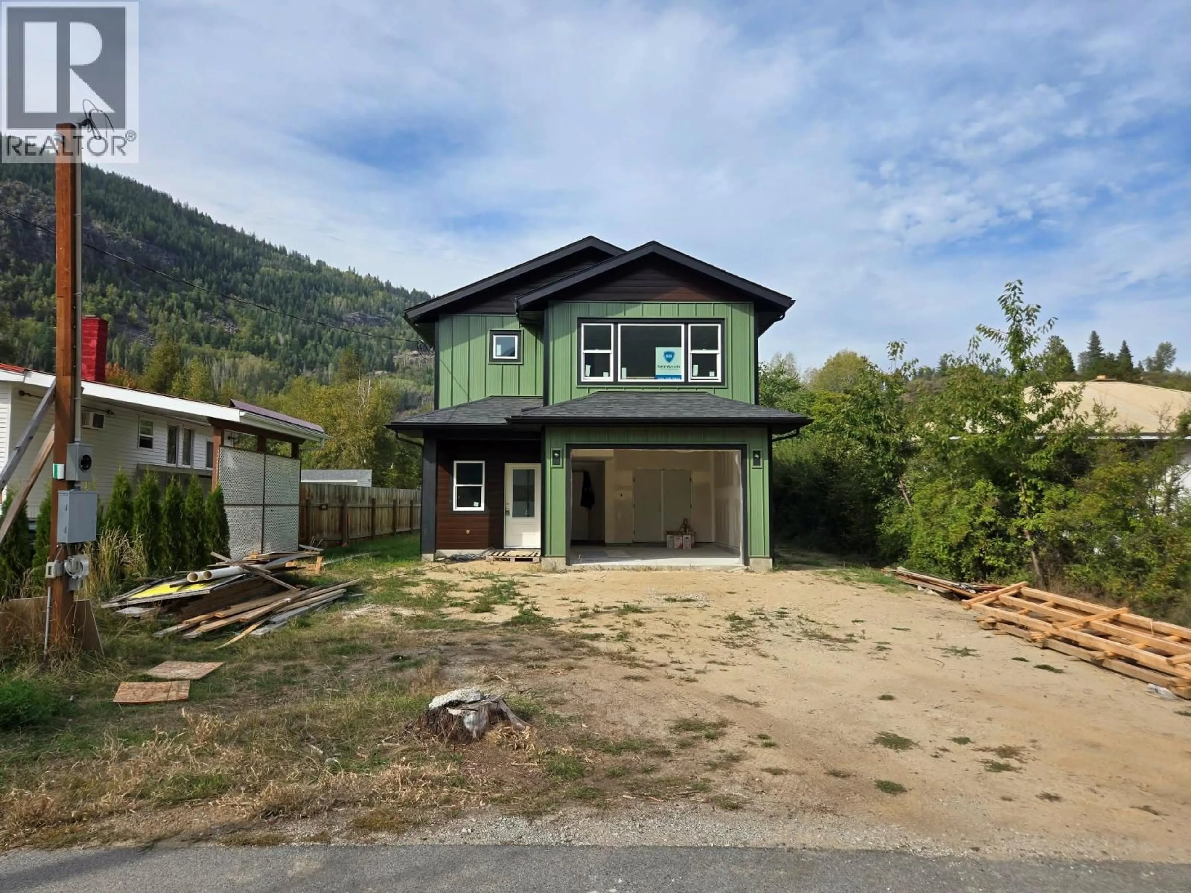 Home with vinyl exterior material, unknown for 209 12TH AVENUE FRONTAGE ROAD, Genelle British Columbia V0G1G0