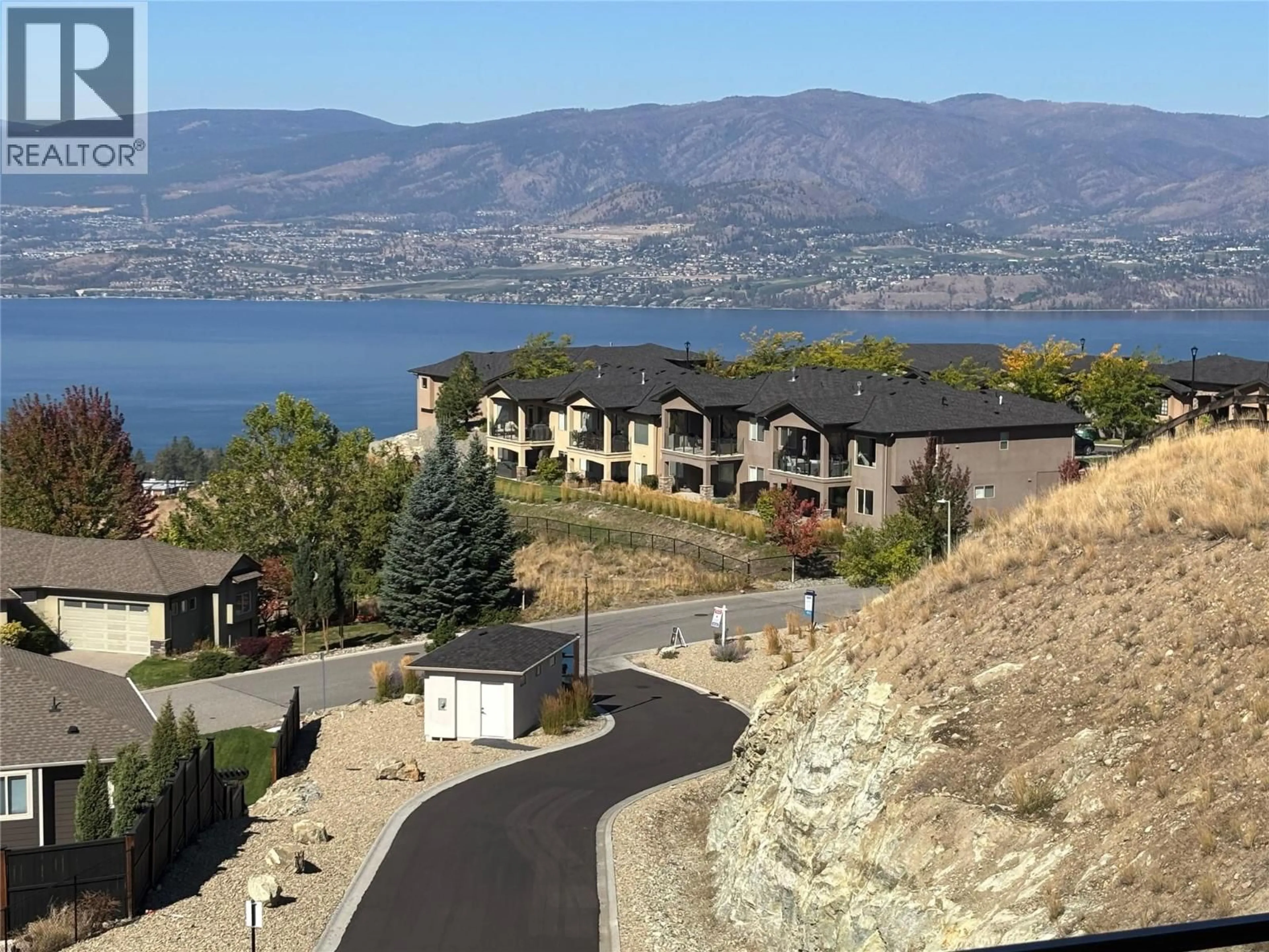 A pic from outside/outdoor area/front of a property/back of a property/a pic from drone, water/lake/river/ocean view for 11 - 796 KUIPERS CRESCENT, Kelowna British Columbia V1W0C2