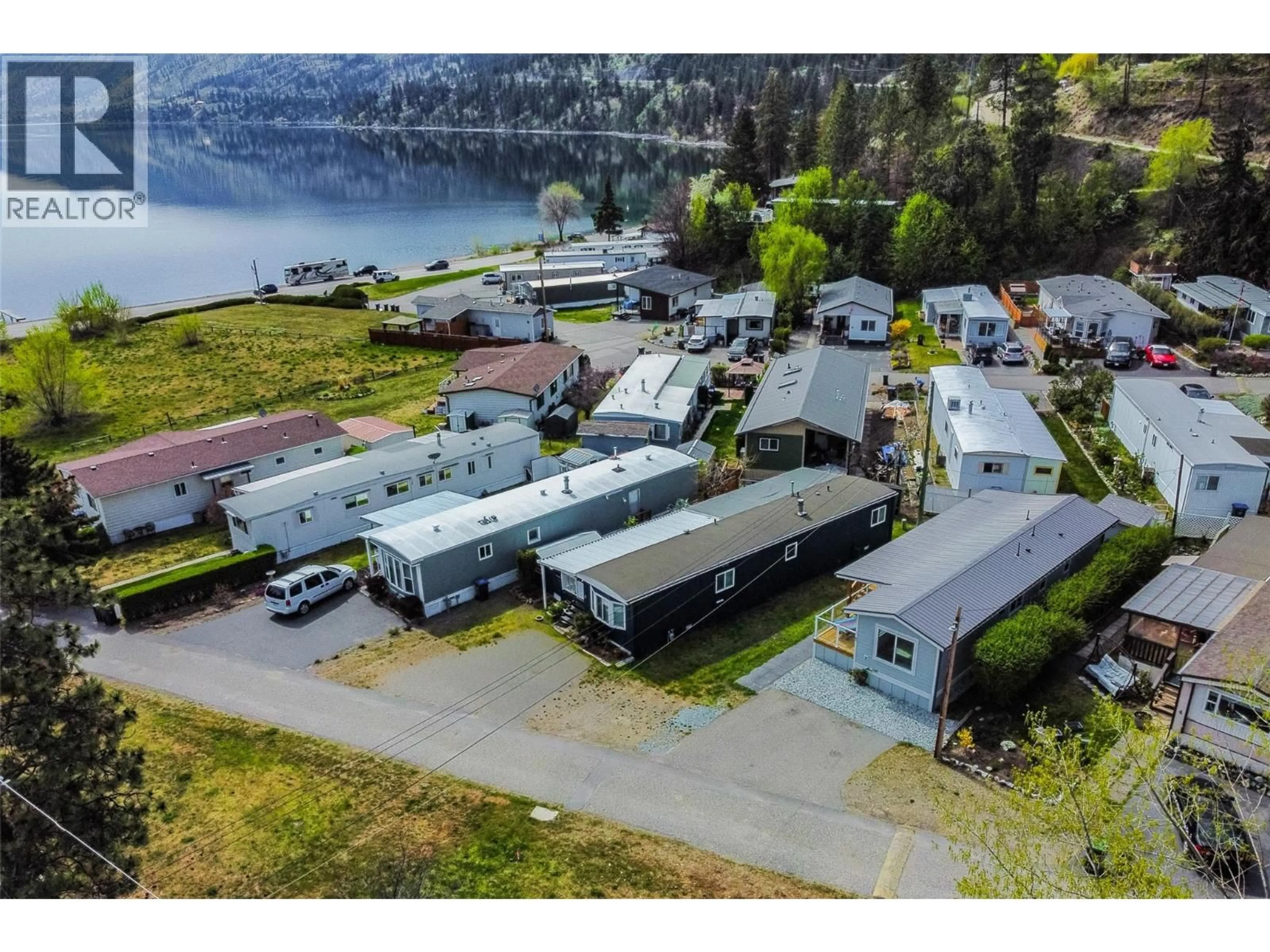 A pic from outside/outdoor area/front of a property/back of a property/a pic from drone, water/lake/river/ocean view for 6 - 6711 HIGHWAY 97 OTHER, Peachland British Columbia V0H1X9