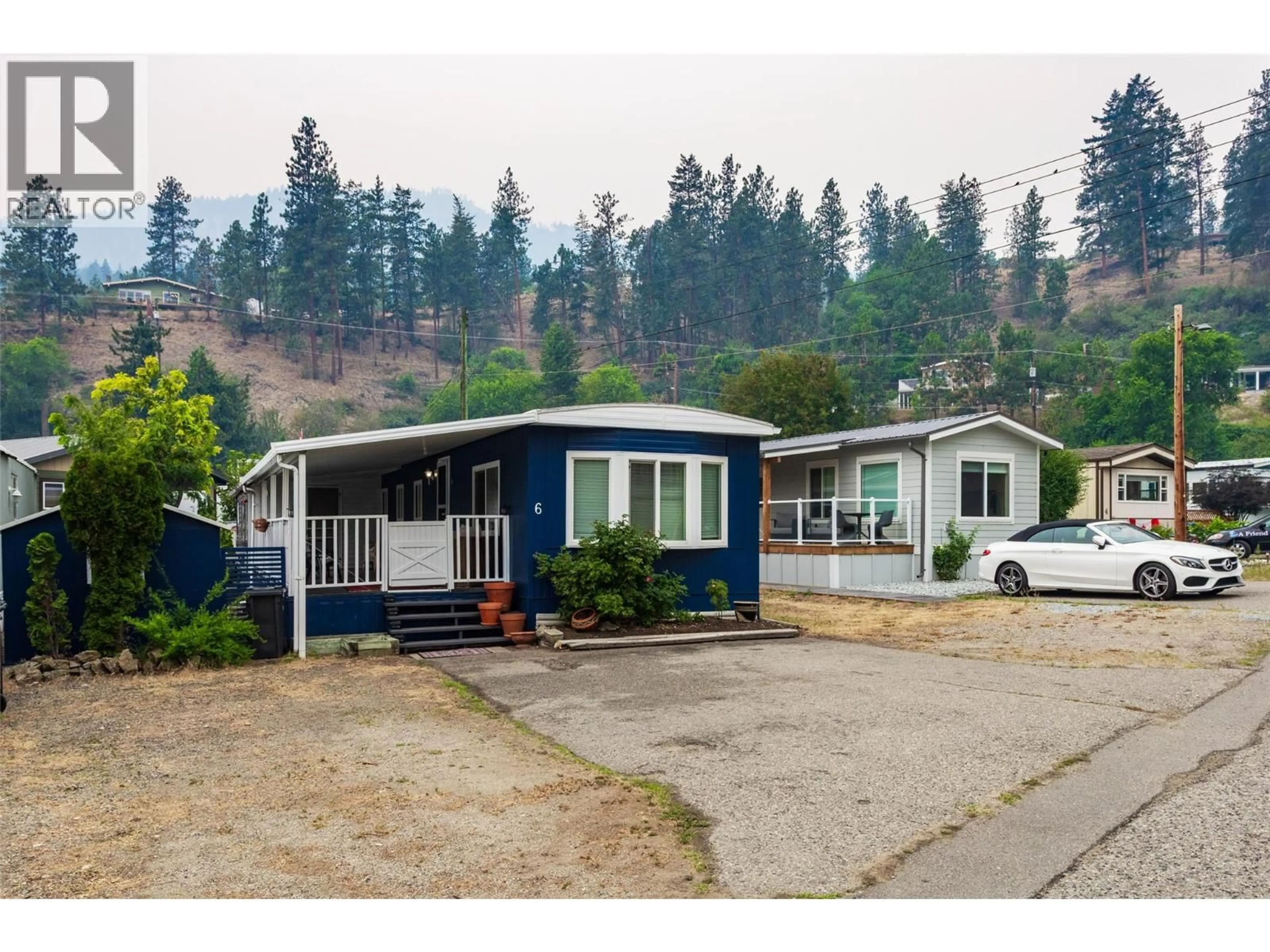 Home with vinyl exterior material, street for 6 - 6711 HIGHWAY 97 OTHER, Peachland British Columbia V0H1X9