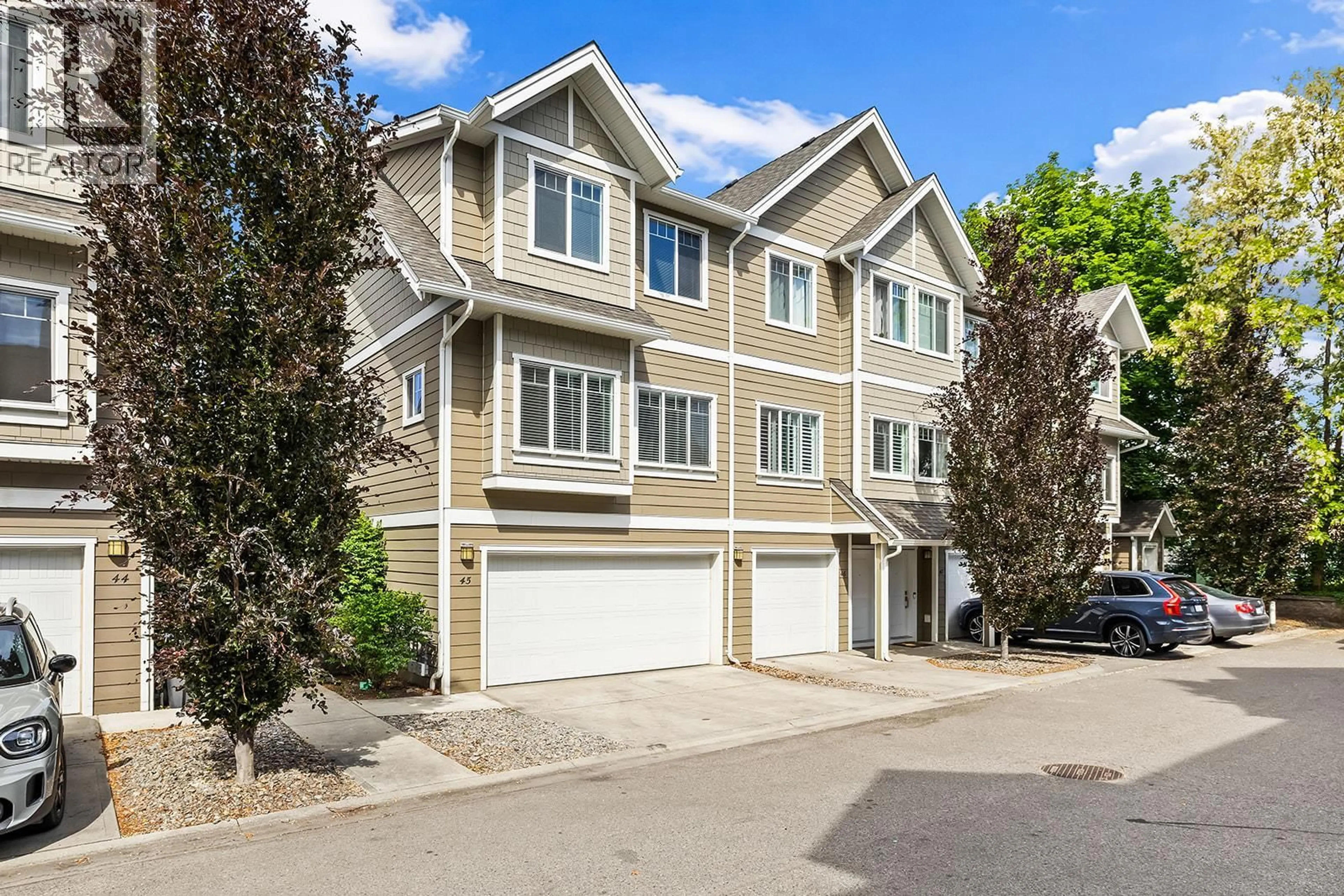 A pic from outside/outdoor area/front of a property/back of a property/a pic from drone, street for 45 - 600 SHERWOOD ROAD, Kelowna British Columbia V1W5K1