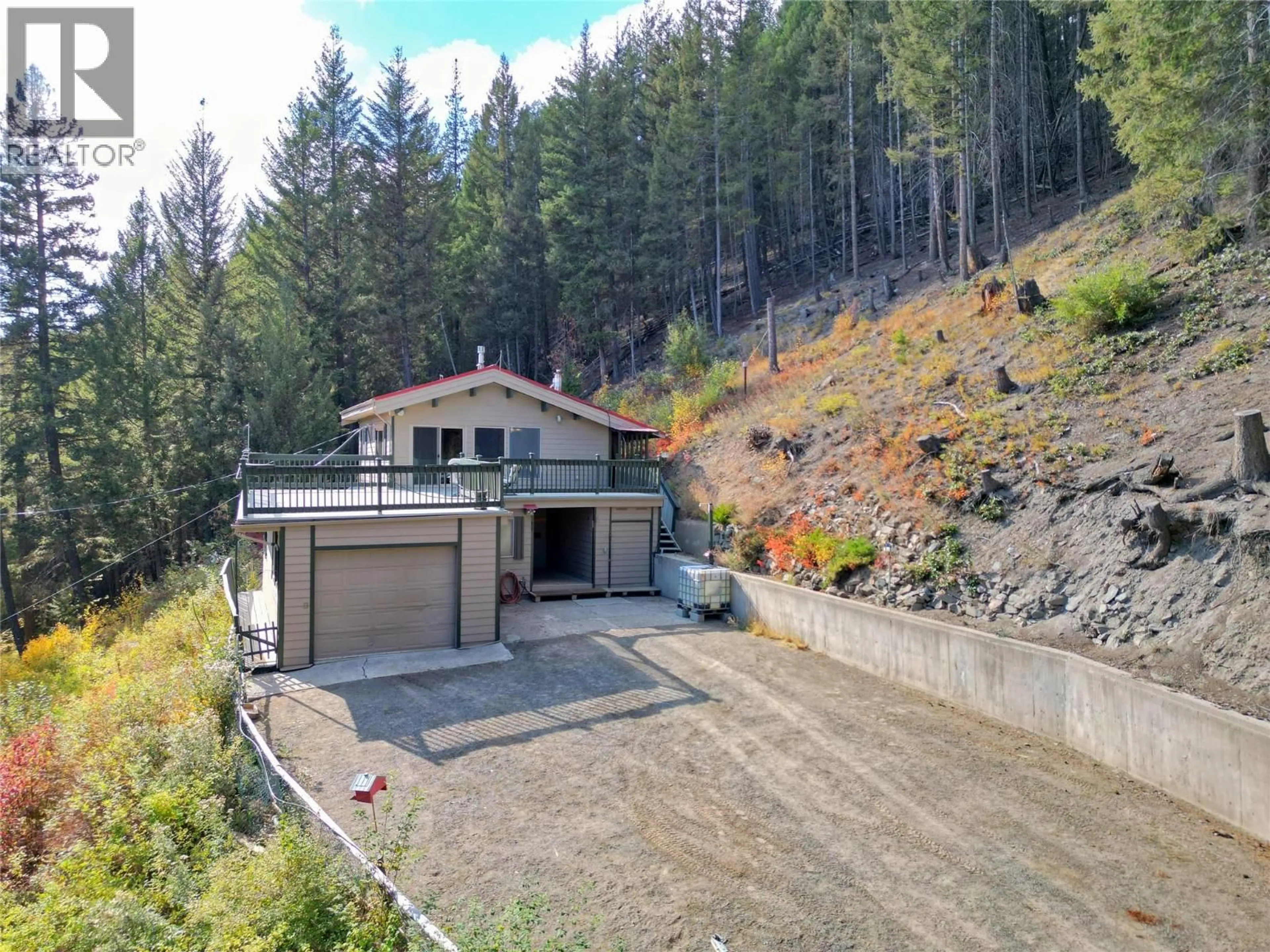 A pic from outside/outdoor area/front of a property/back of a property/a pic from drone, unknown for 114 THISTLE ROAD, Princeton British Columbia V0X1W0