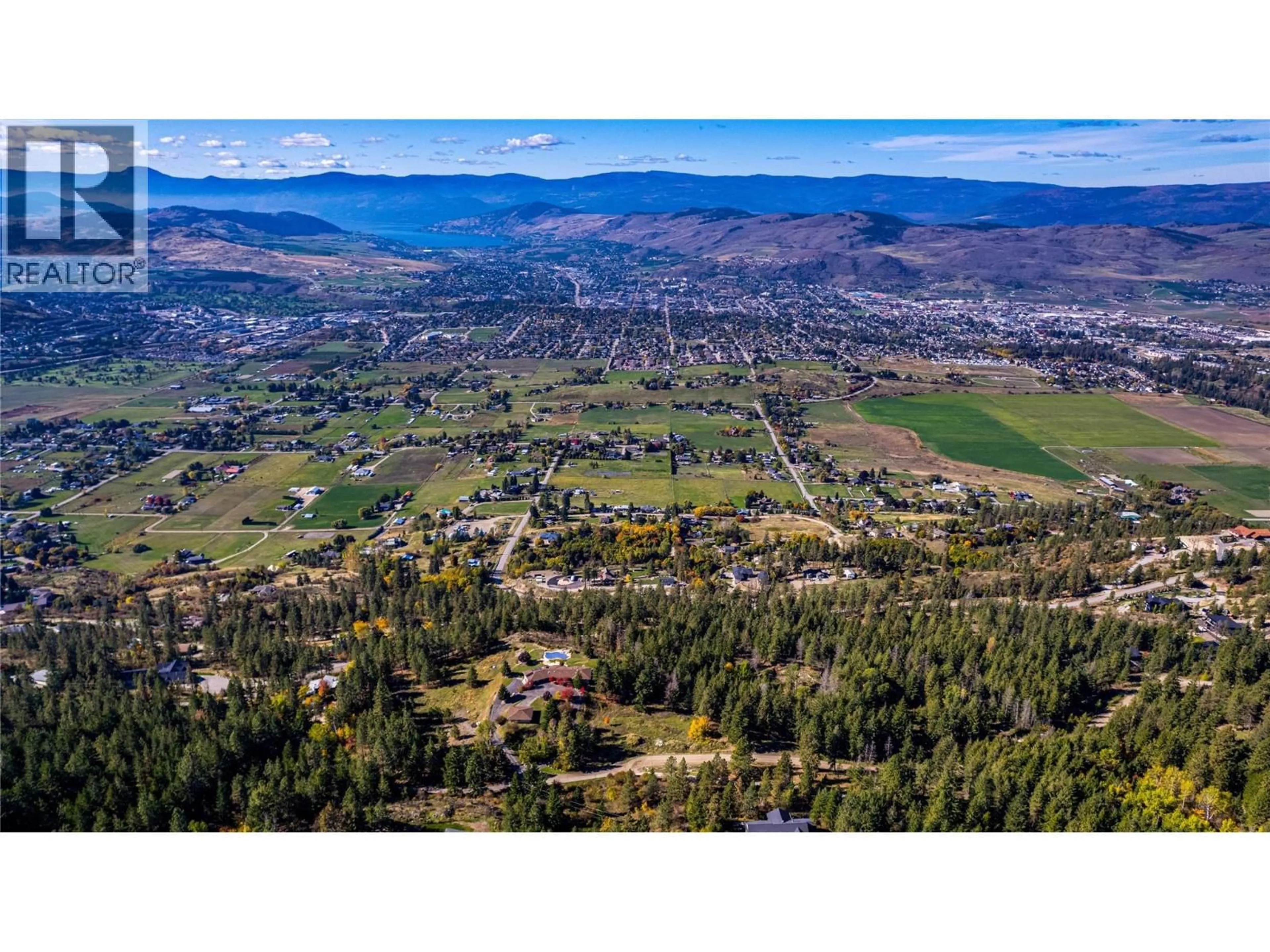 A pic from outside/outdoor area/front of a property/back of a property/a pic from drone, mountain view for 3200 GREENWOOD ROAD, Vernon British Columbia V1B4G5