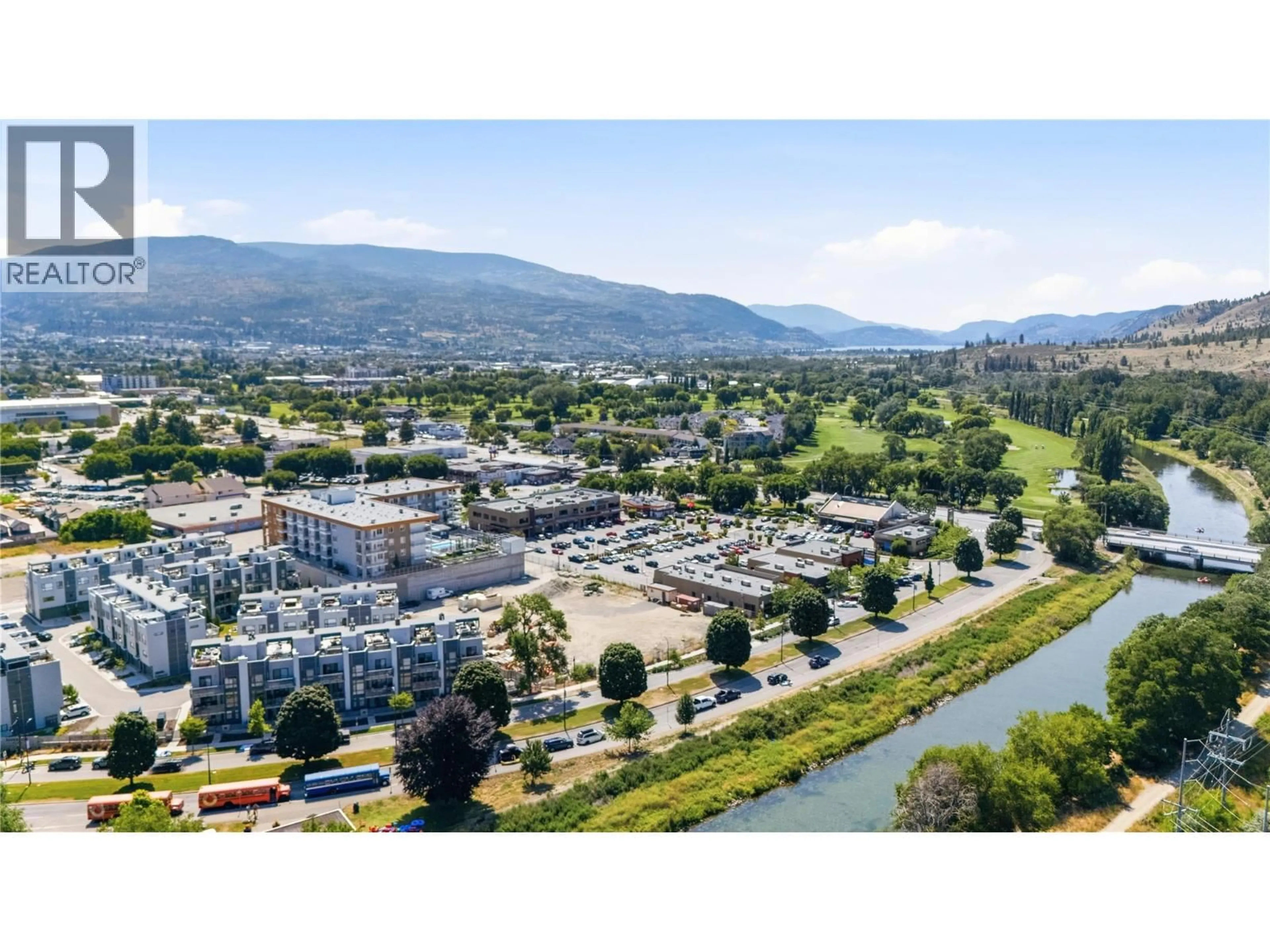 A pic from outside/outdoor area/front of a property/back of a property/a pic from drone, mountain view for 412 - 270 RIVERSIDE DRIVE, Penticton British Columbia V2A5Y5