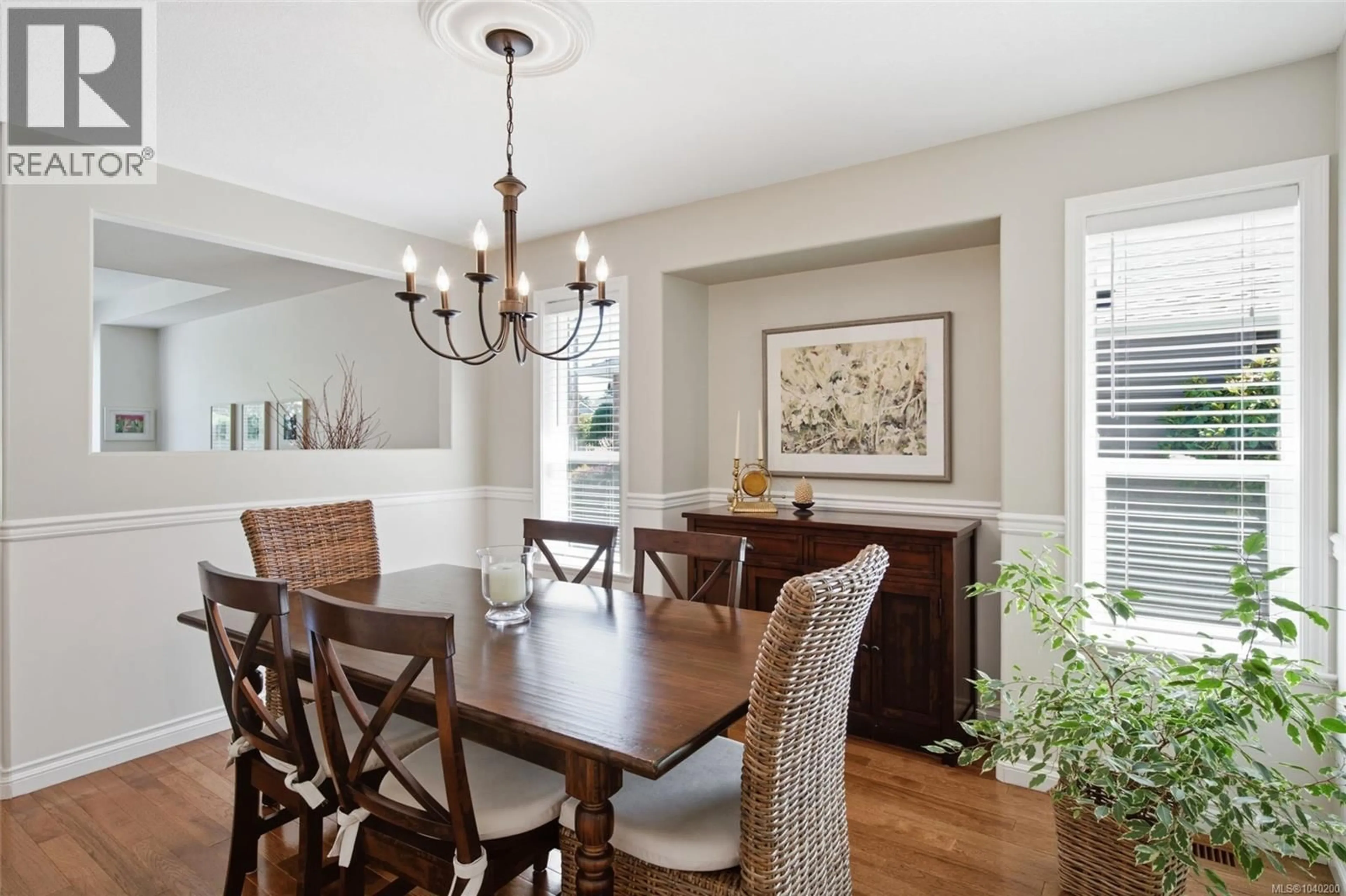 Dining room, wood/laminate floor for 819 MULHOLLAND DRIVE, French Creek British Columbia V9P2K5